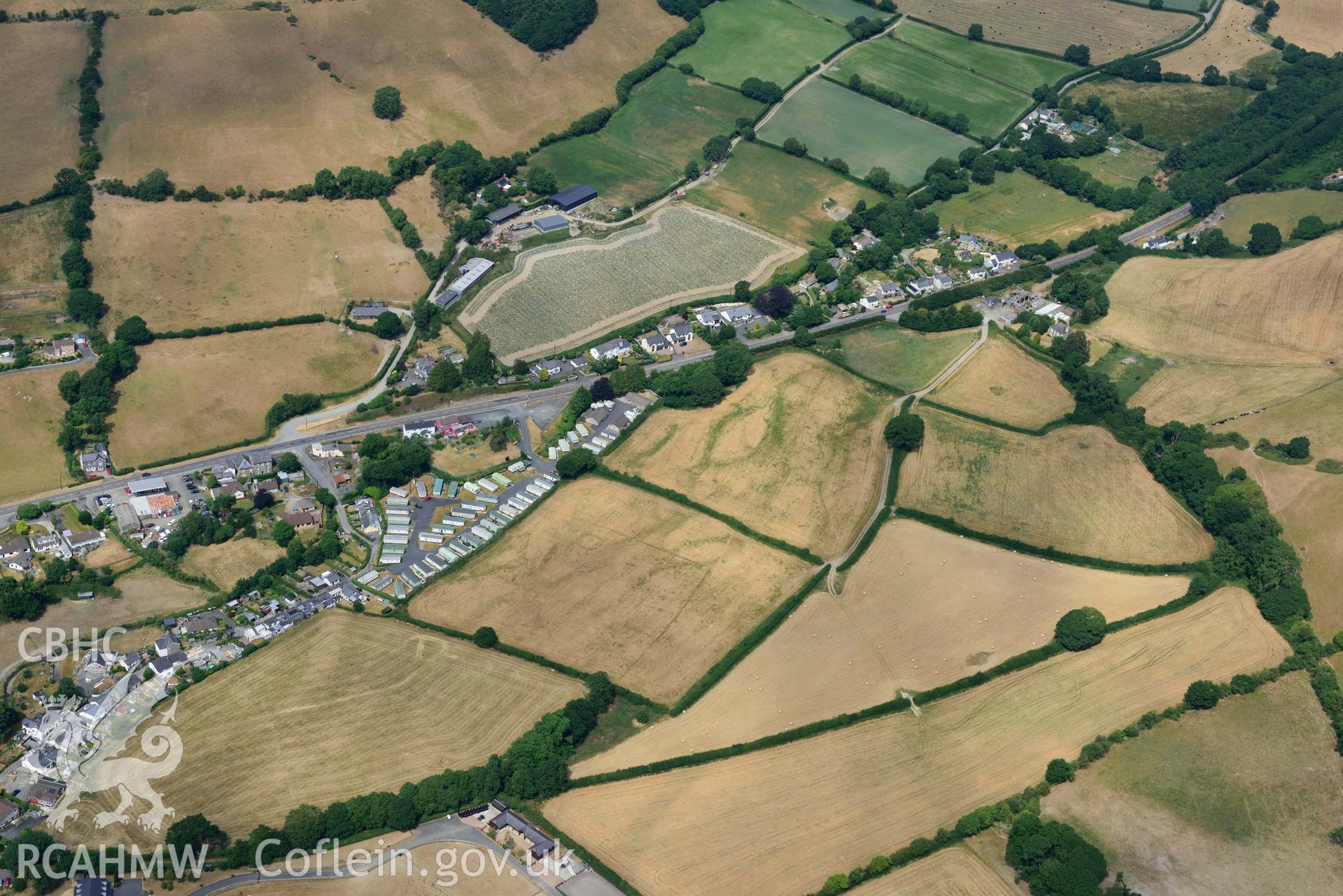 Aerial photograph: Dolypandy round barrow cropmarks, view looking east. Crown: CHERISH PROJECT 2018. Produced with EU funds through the Ireland Wales Co-operation Programme 2014-2020 (NGR SN662800)