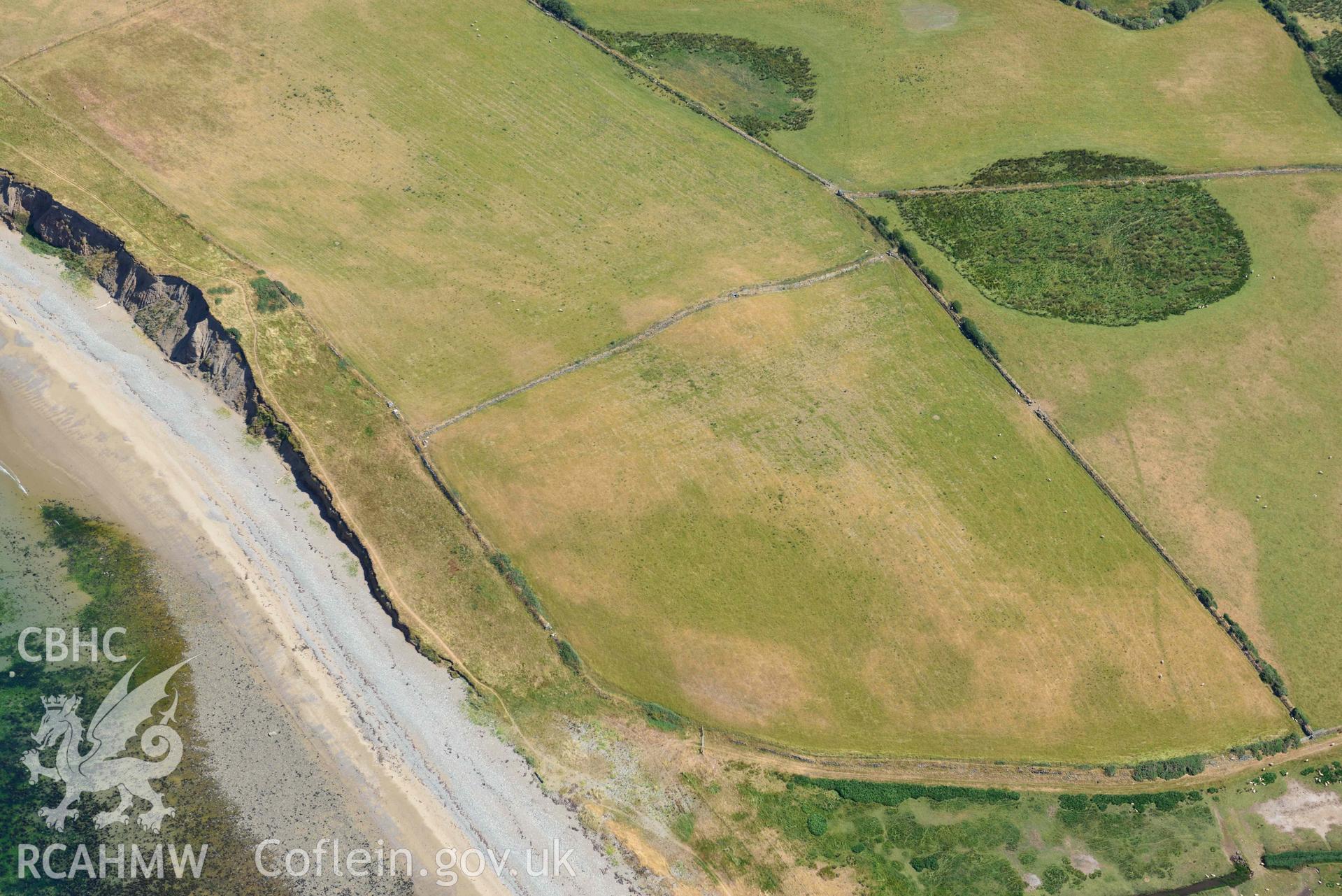 Aerial photograph: Field system south of Dinas Dinlle, view from south-west. Crown: CHERISH PROJECT 2018. Produced with EU funds through the Ireland Wales Co-operation Programme 2014-2020 (NGR: SH436557)