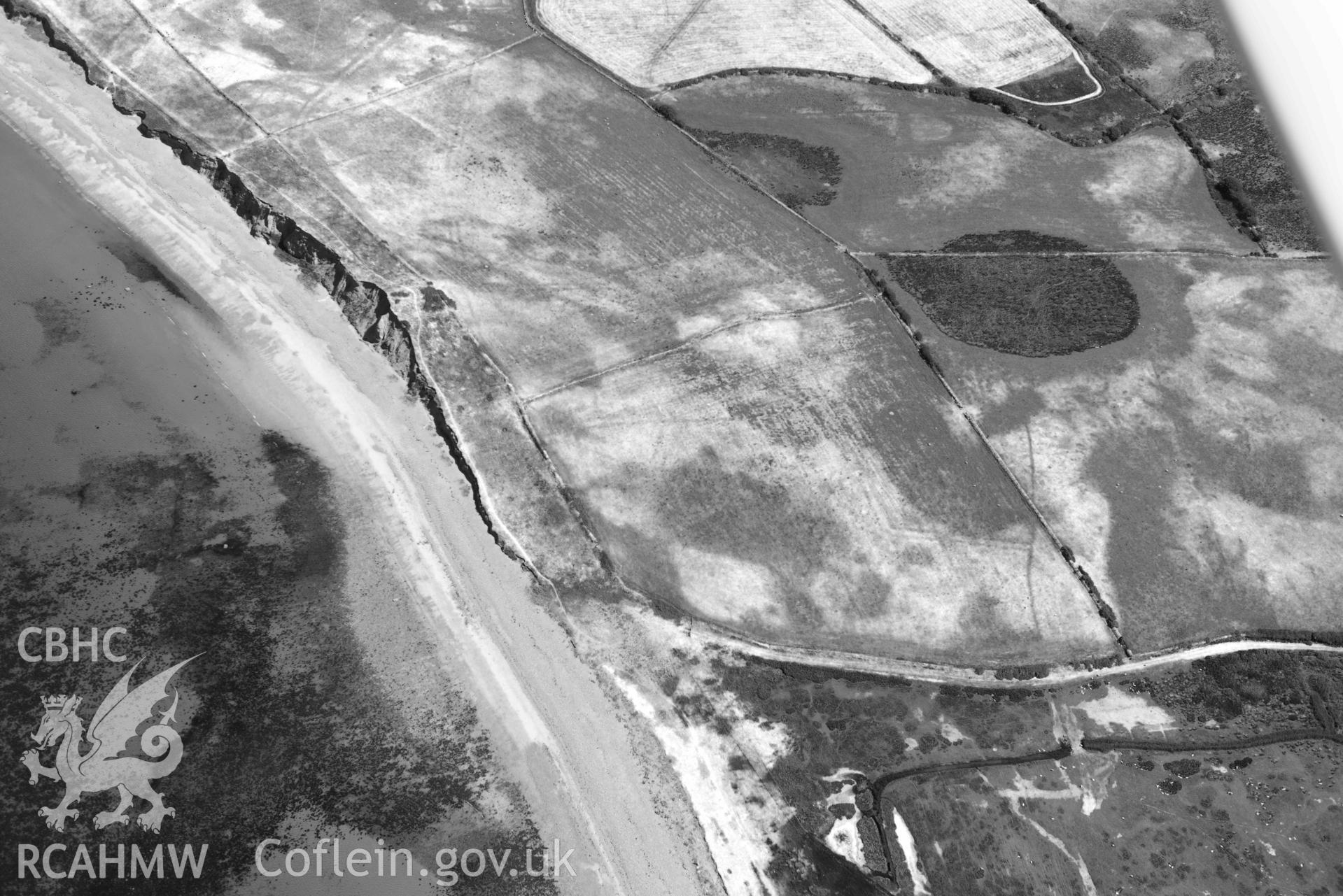 Aerial photograph: Field system south of Dinas Dinlle, view from south-west. Crown: CHERISH PROJECT 2018. Produced with EU funds through the Ireland Wales Co-operation Programme 2014-2020 (NGR: SH436557)