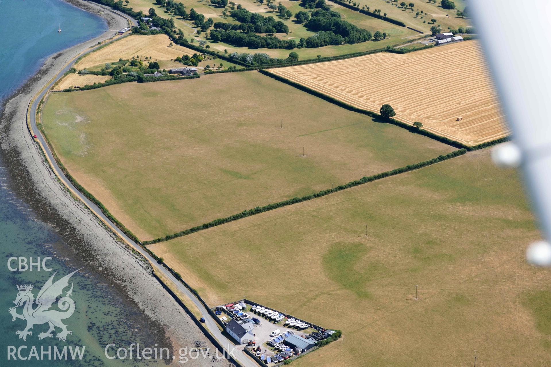 Aerial photograph: Plas Farm, early field systems, cropmarks. Crown: CHERISH PROJECT 2018. Produced with EU funds through the Ireland Wales Co-operation Programme 2014-2020 (NGR: SH456615)