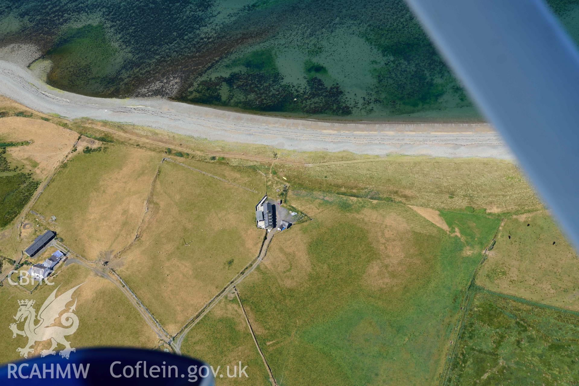 Aerial photograph: Cropmarks of settlement and early fields at Ynys-fach. Crown: CHERISH PROJECT 2018. Produced with EU funds through the Ireland Wales Co-operation Programme 2014-2020 (NGR: SH435544)