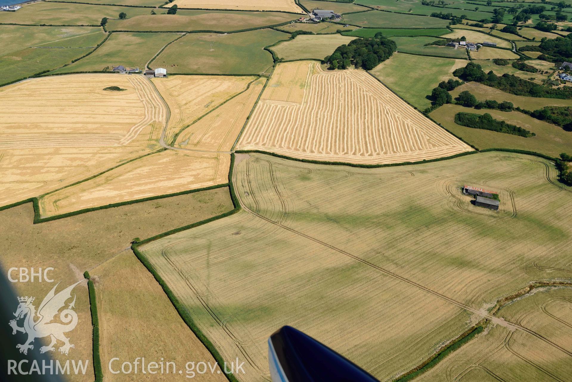 Aerial photograph: Enclosure cropmark east of St Baglan's Church. Crown: CHERISH PROJECT 2018. Produced with EU funds through the Ireland Wales Co-operation Programme 2014-2020 (NGR: SH457604)