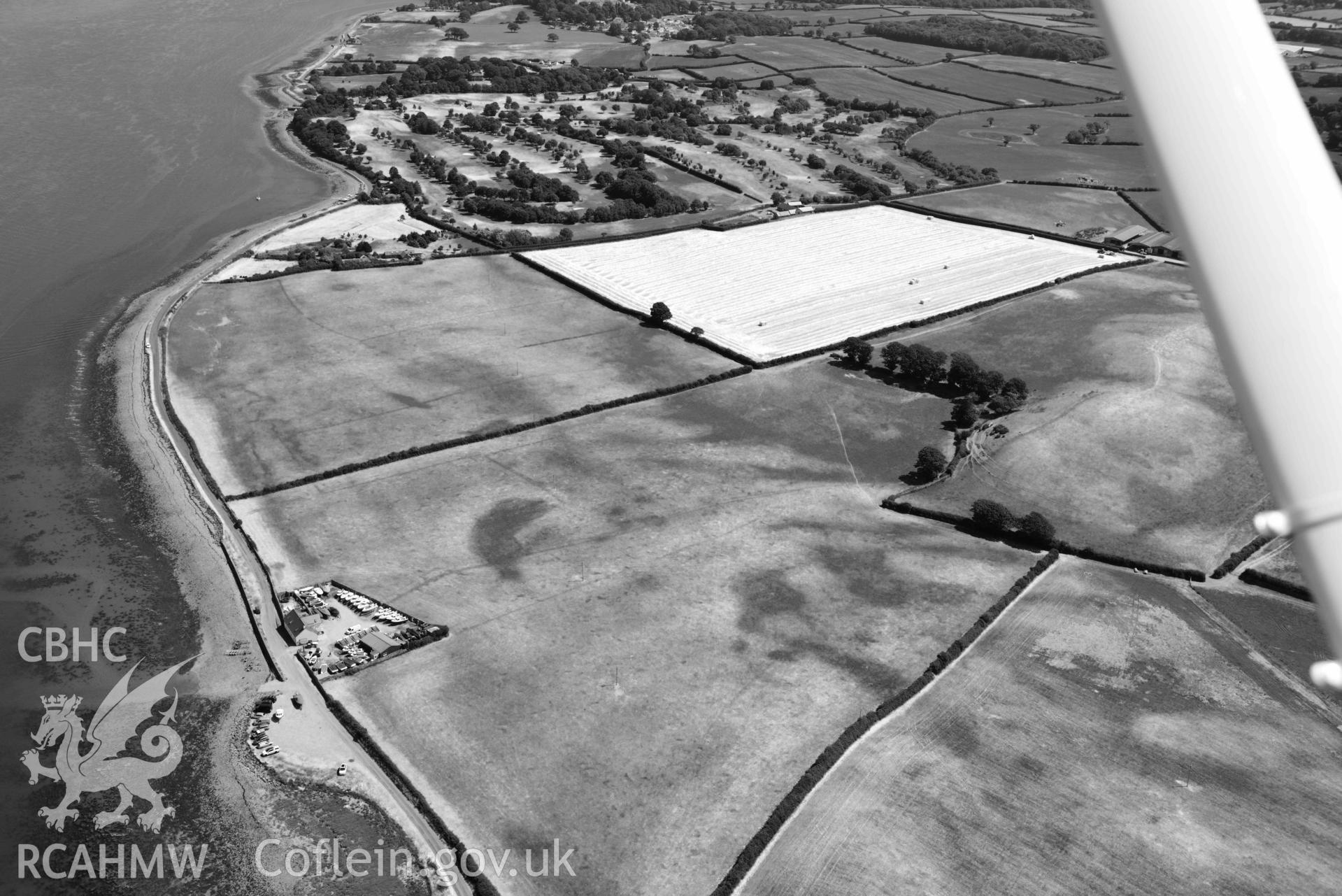 Aerial photograph: Plas Farm, early field systems, cropmarks. Crown: CHERISH PROJECT 2018. Produced with EU funds through the Ireland Wales Co-operation Programme 2014-2020 (NGR: SH456615)