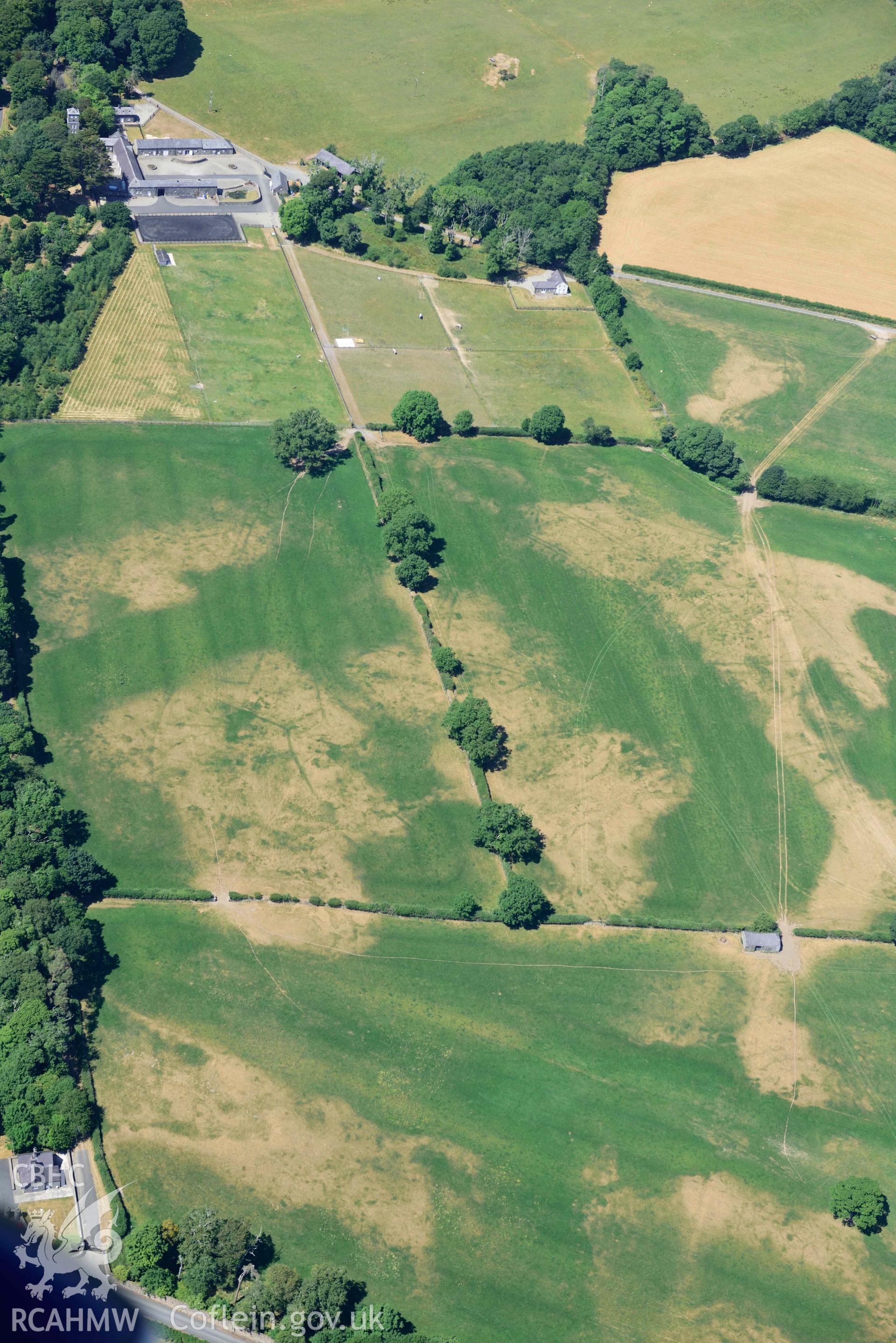 Aerial photograph: Broom Hall parkland; sundry cropmarks of relict field systems to south-east of stables. Crown: CHERISH PROJECT 2018. Produced with EU funds through the Ireland Wales Co-operation Programme 2014-2020 (NGR SH416369)