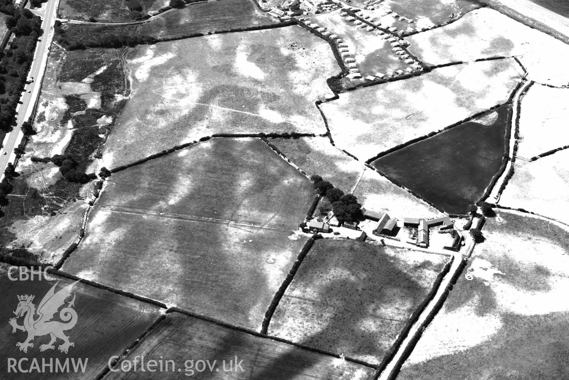 Aerial photograph: Maes Mawr, cropmark enclosure and ring ditch. Crown: CHERISH PROJECT 2018. Produced with EU funds through the Ireland Wales Co-operation Programme 2014-2020 (NGR: SH438536)