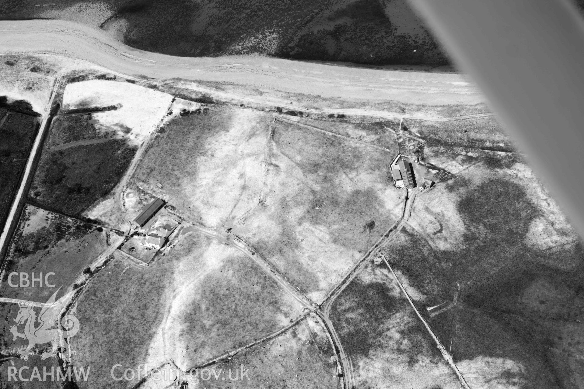 Aerial photograph: Cropmarks of settlement and early fields at Ynys-fach. Crown: CHERISH PROJECT 2018. Produced with EU funds through the Ireland Wales Co-operation Programme 2014-2020 (NGR: SH435544)