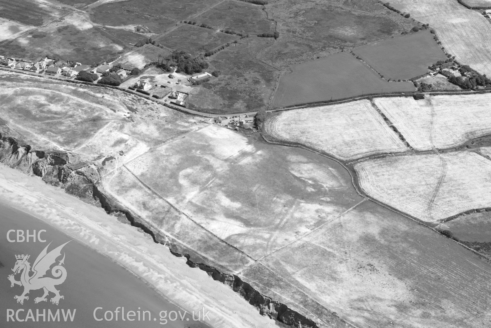 Aerial photograph: Field system south of Dinas Dinlle, view from south-west. Crown: CHERISH PROJECT 2018. Produced with EU funds through the Ireland Wales Co-operation Programme 2014-2020 (NGR: SH438561)