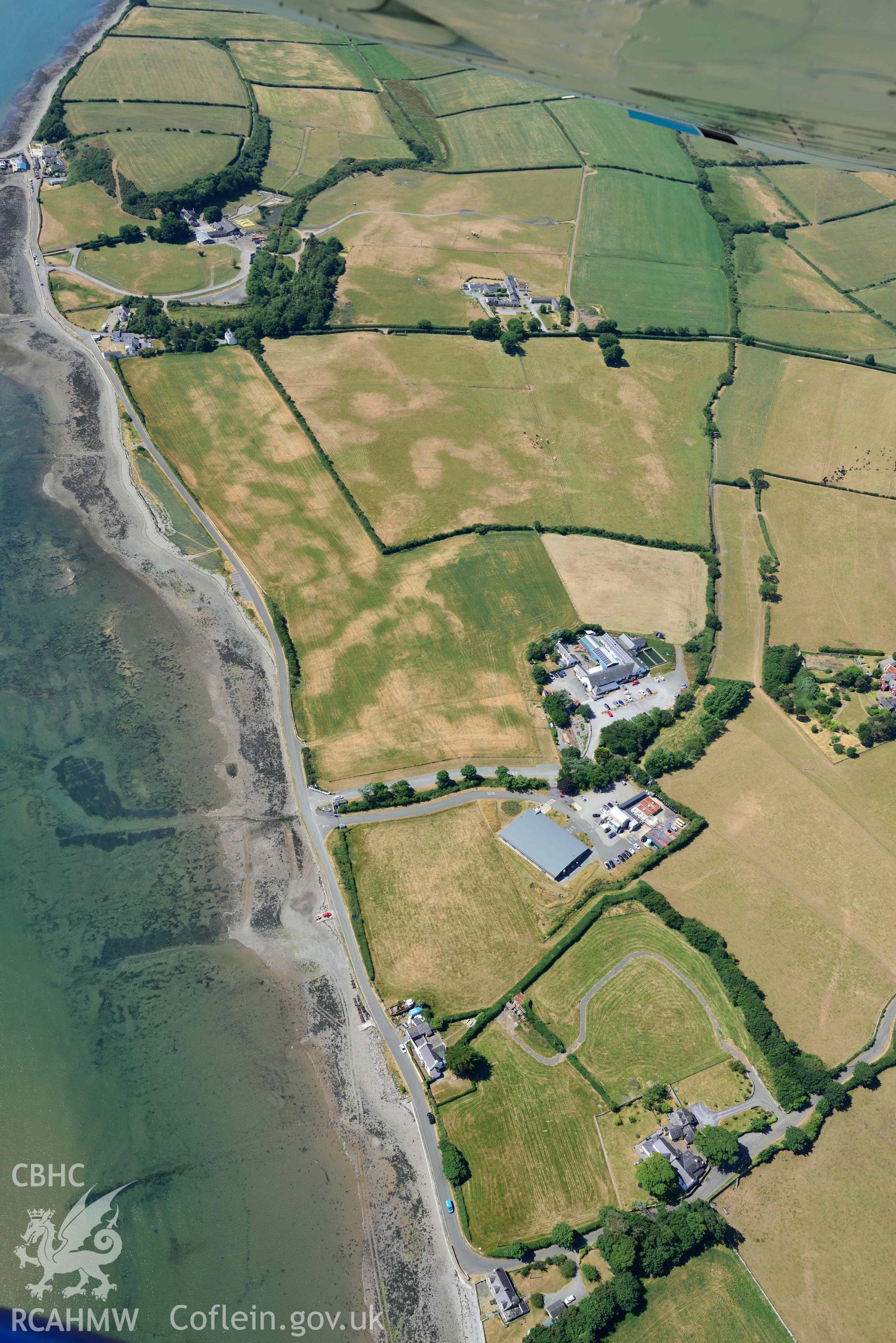 Aerial photograph: Tai Cochion Roman settlement, parchmarks, with Roman streets. Crown: CHERISH PROJECT 2018. Produced with EU funds through the Ireland Wales Co-operation Programme 2014-2020 (NGR: SH479656)