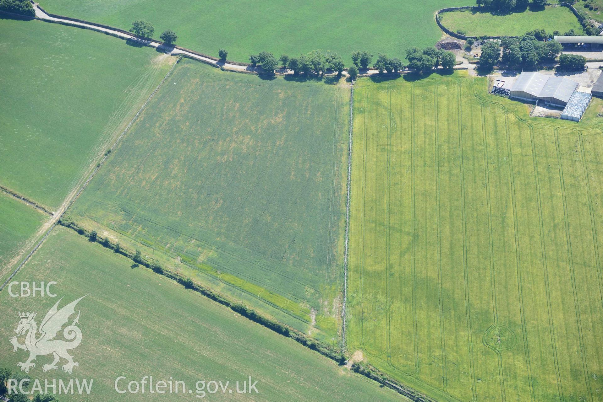 Aerial photograph: Castellior circular and rectangular cropmarks. Crown: CHERISH PROJECT 2018. Produced with EU funds through the Ireland Wales Co-operation Programme 2014-2020 (NGR: SH544744)