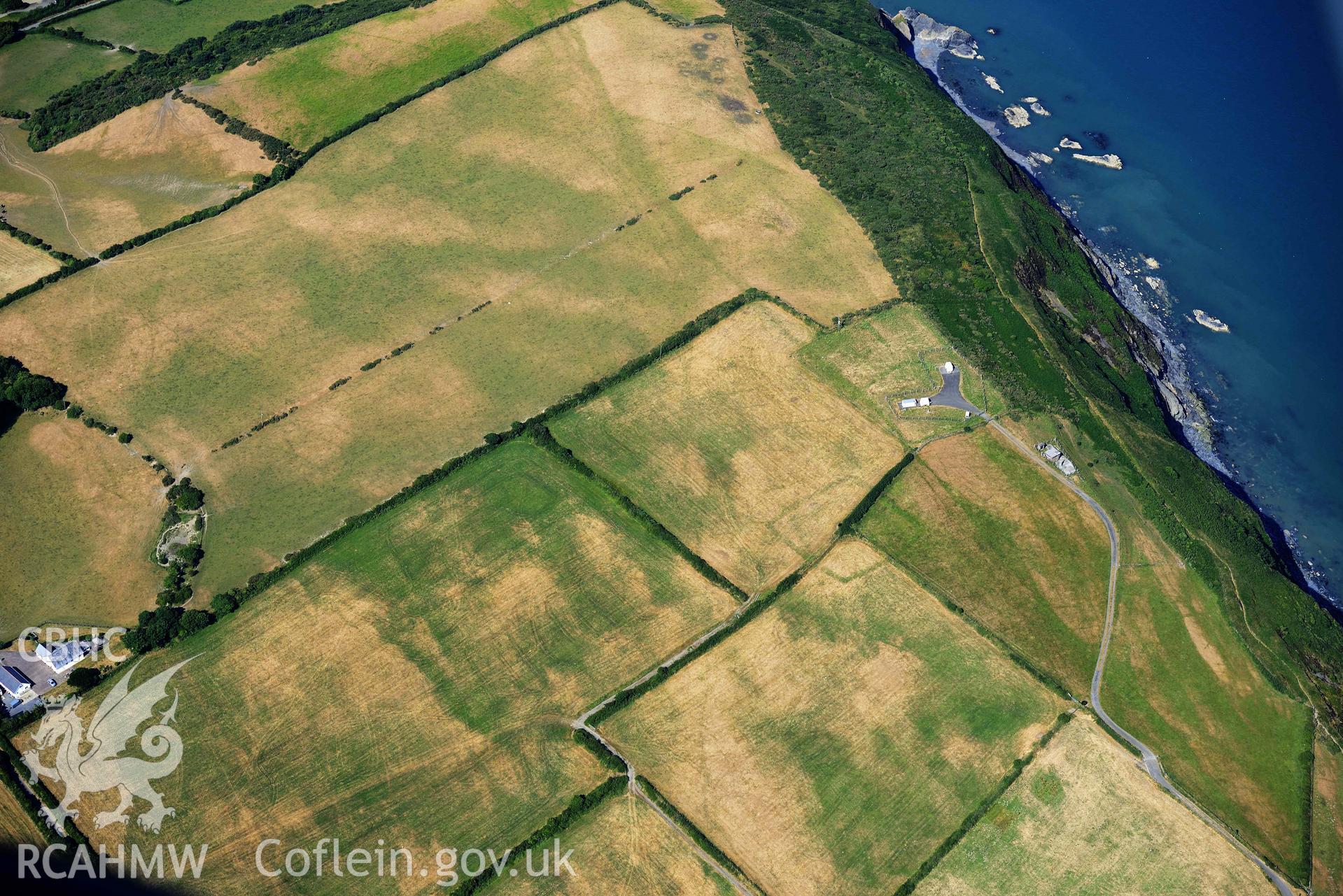 Aerial photograph: Ty Hen defended enclosure, cropmarks. Crown: CHERISH PROJECT 2018. Produced with EU funds through the Ireland Wales Co-operation Programme 2014-2020 (NGR: SN286517)