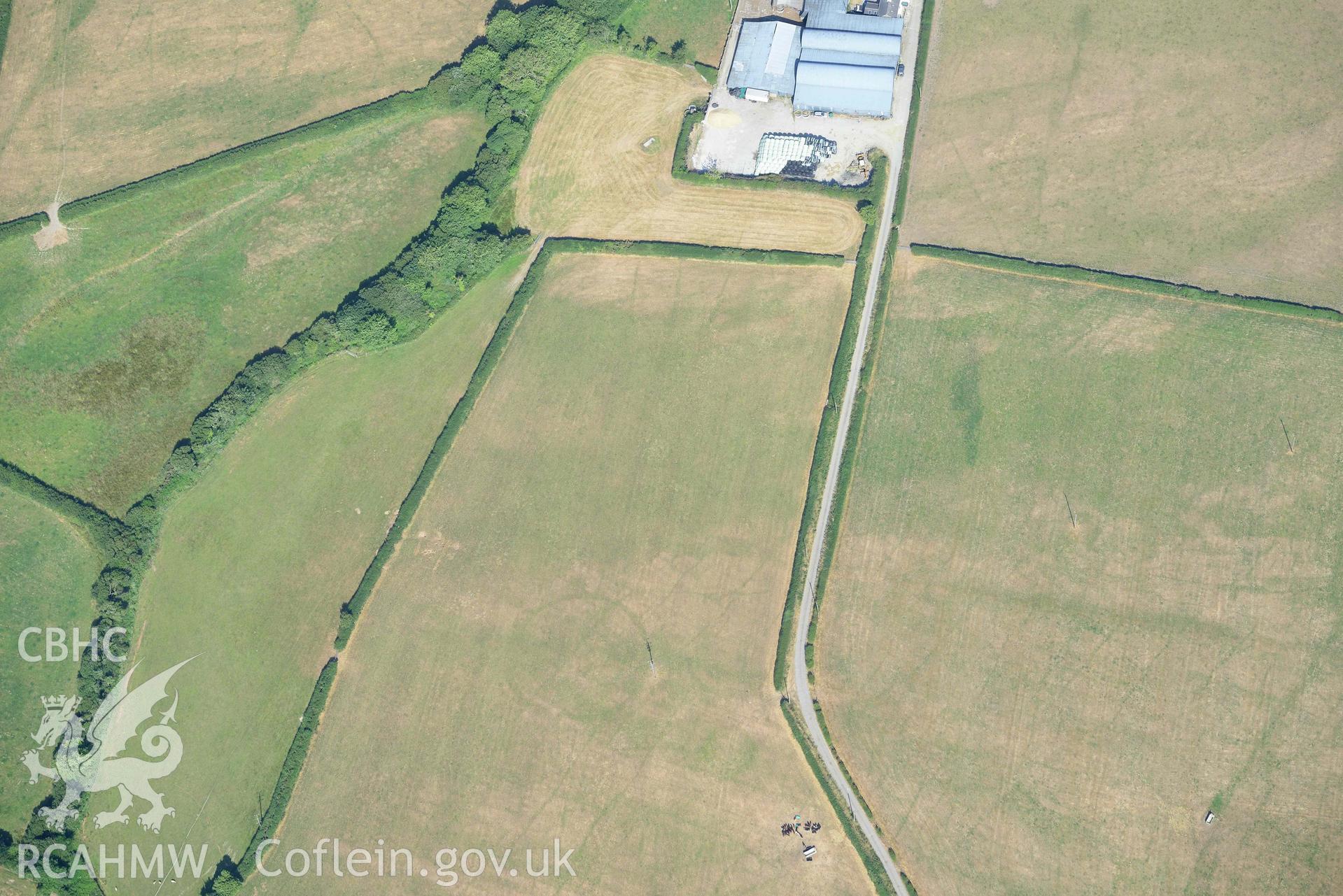 Aerial photograph: Eisteddfa circular enclosure cropmarks. Crown: CHERISH PROJECT 2018. Produced with EU funds through the Ireland Wales Co-operation Programme 2014-2020 (NGR: SN314529)