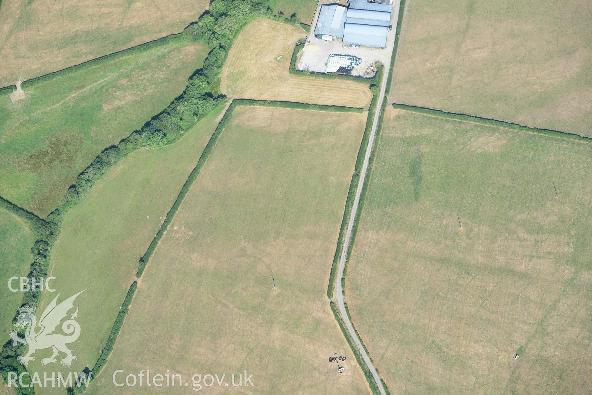 Aerial photograph: Eisteddfa circular enclosure cropmarks. Crown: CHERISH PROJECT 2018. Produced with EU funds through the Ireland Wales Co-operation Programme 2014-2020 (NGR: SN314529)