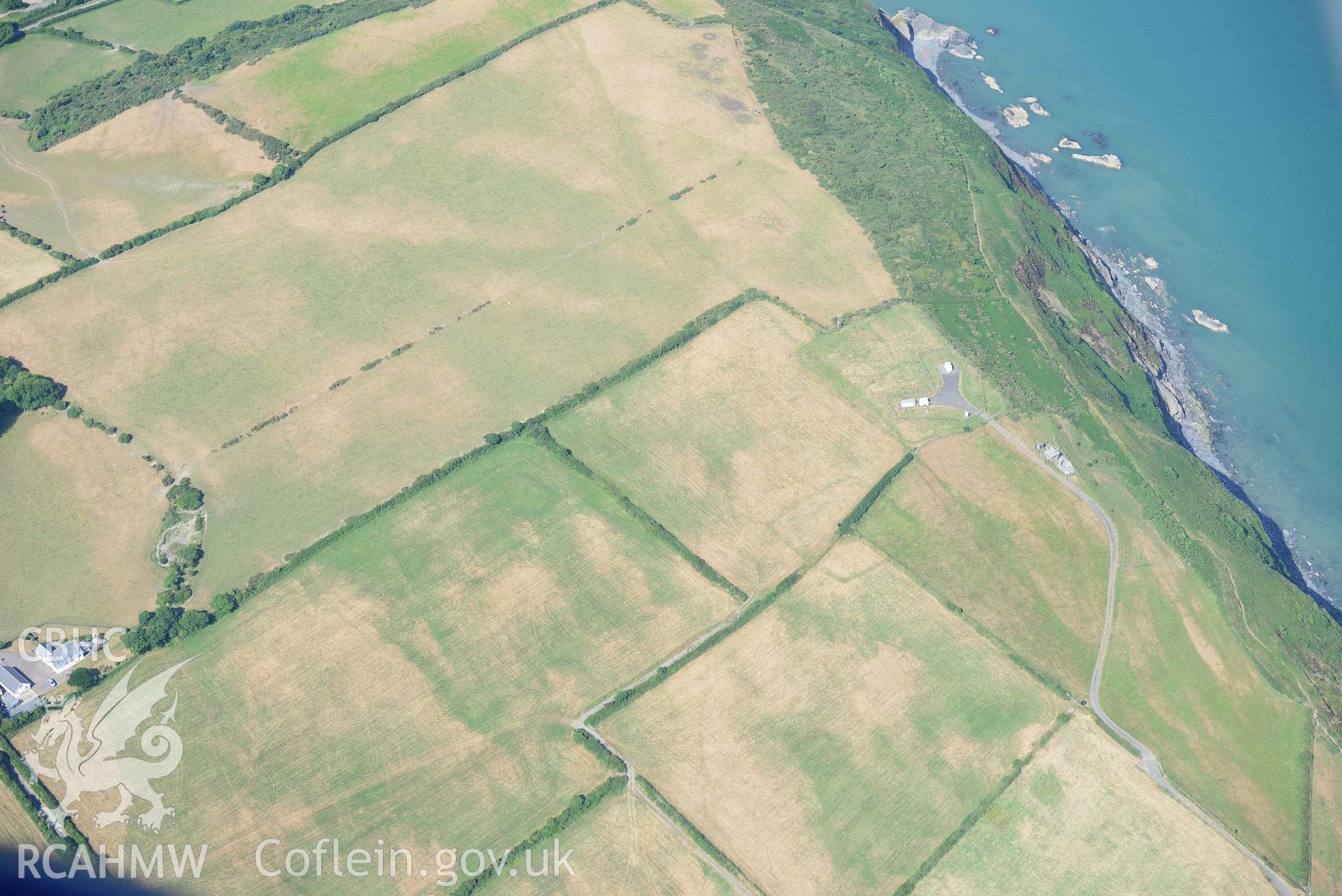 Aerial photograph: Ty Hen defended enclosure, cropmarks. Crown: CHERISH PROJECT 2018. Produced with EU funds through the Ireland Wales Co-operation Programme 2014-2020 (NGR: SN286517)