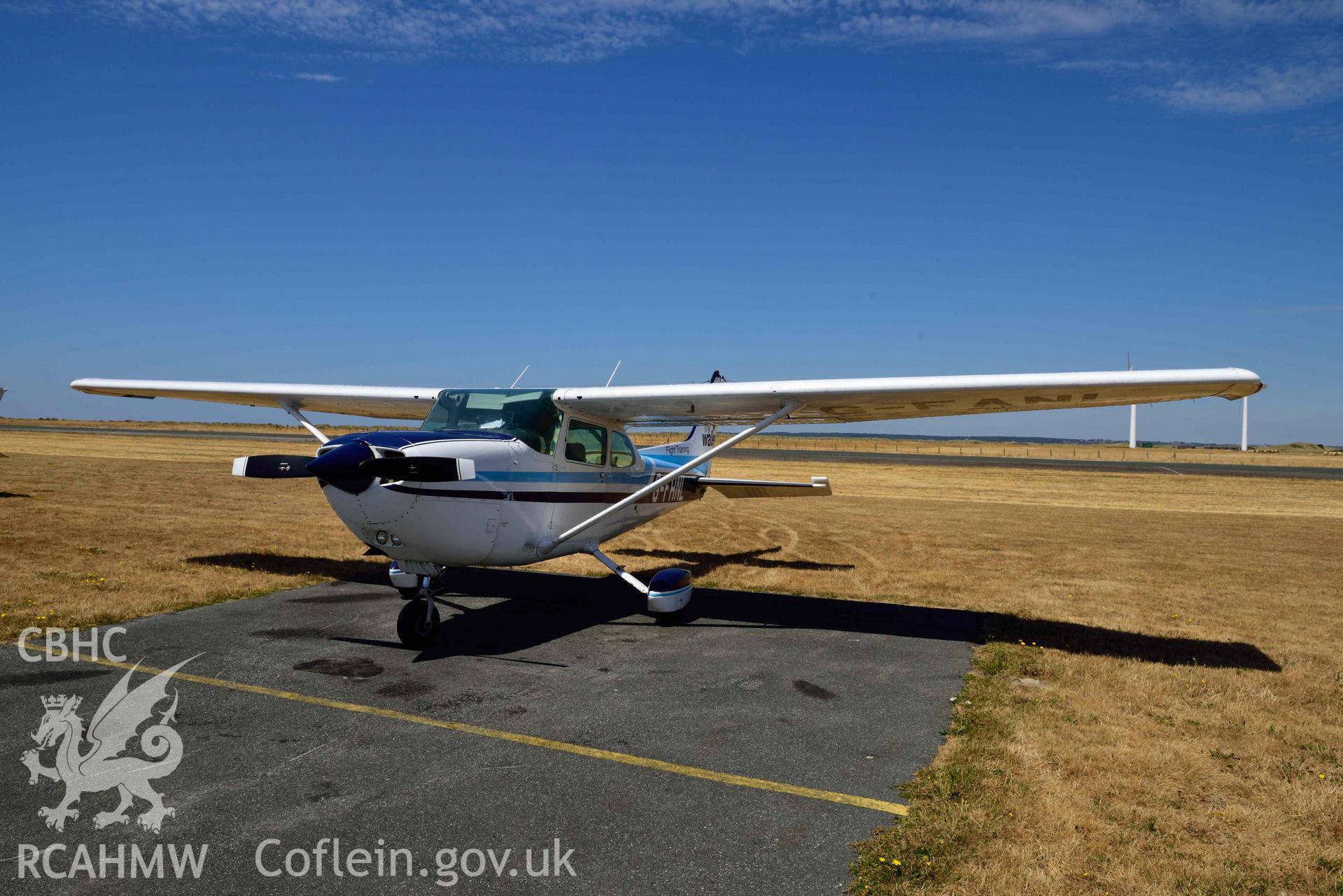 Cessna 172 parked up at Caernarfon Airport for fuel and lunch. Crown: CHERISH PROJECT 2018. Produced with EU funds through the Ireland Wales Co-operation Programme 2014-2020 (NGR: SH436586)