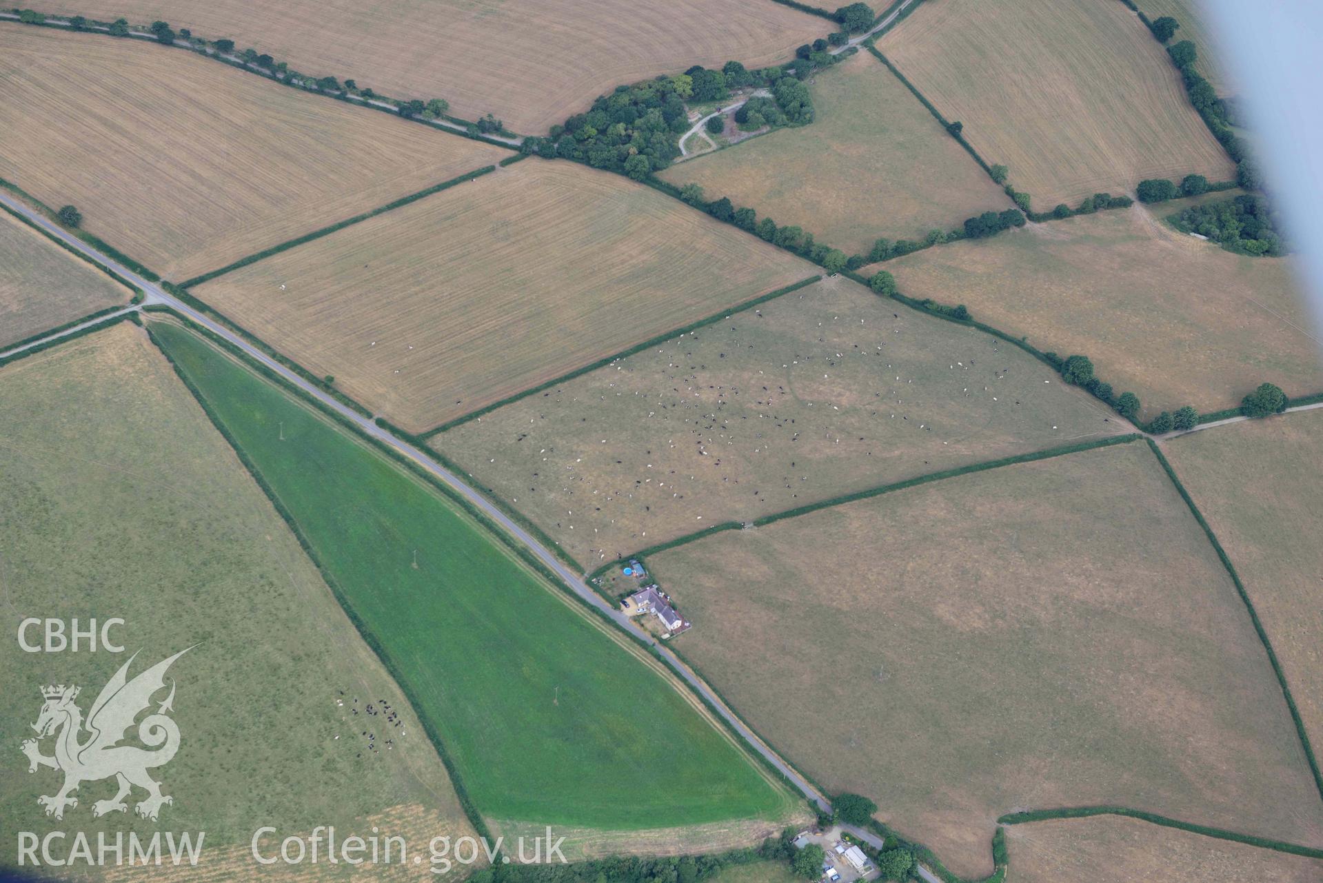 Aerial photograph: Penwaun or Pengelli-fach defended enclosure cropmark. Crown: CHERISH PROJECT 2018. Produced with EU funds through the Ireland Wales Co-operation Programme 2014-2020 (NGR: SN293405)