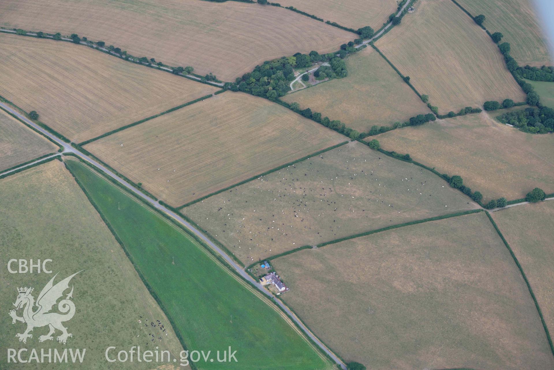 Aerial photograph: Penwaun or Pengelli-fach defended enclosure cropmark. Crown: CHERISH PROJECT 2018. Produced with EU funds through the Ireland Wales Co-operation Programme 2014-2020 (NGR: SN293405)