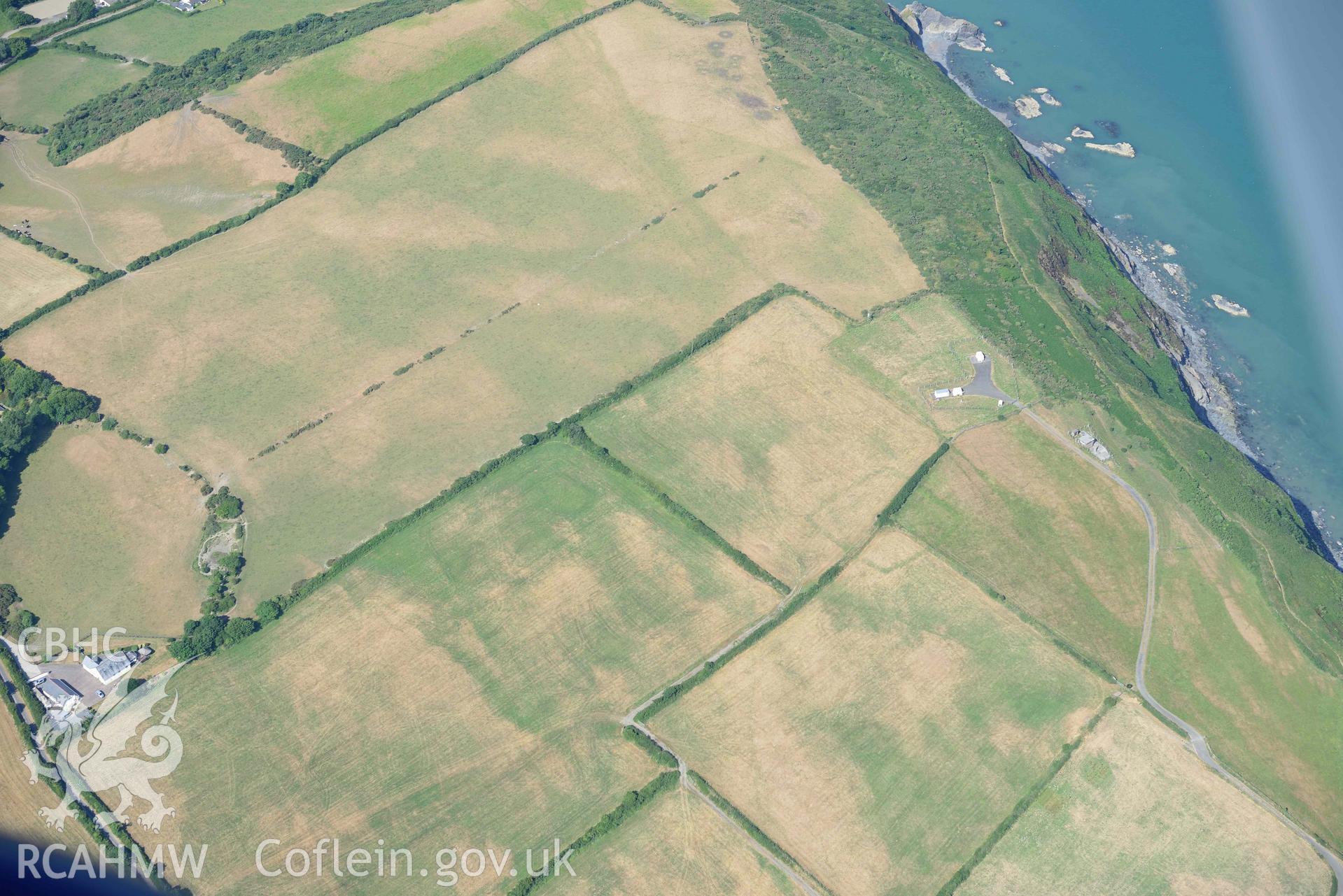 Aerial photograph: Ty Hen defended enclosure, cropmarks. Crown: CHERISH PROJECT 2018. Produced with EU funds through the Ireland Wales Co-operation Programme 2014-2020 (NGR: SN286517)