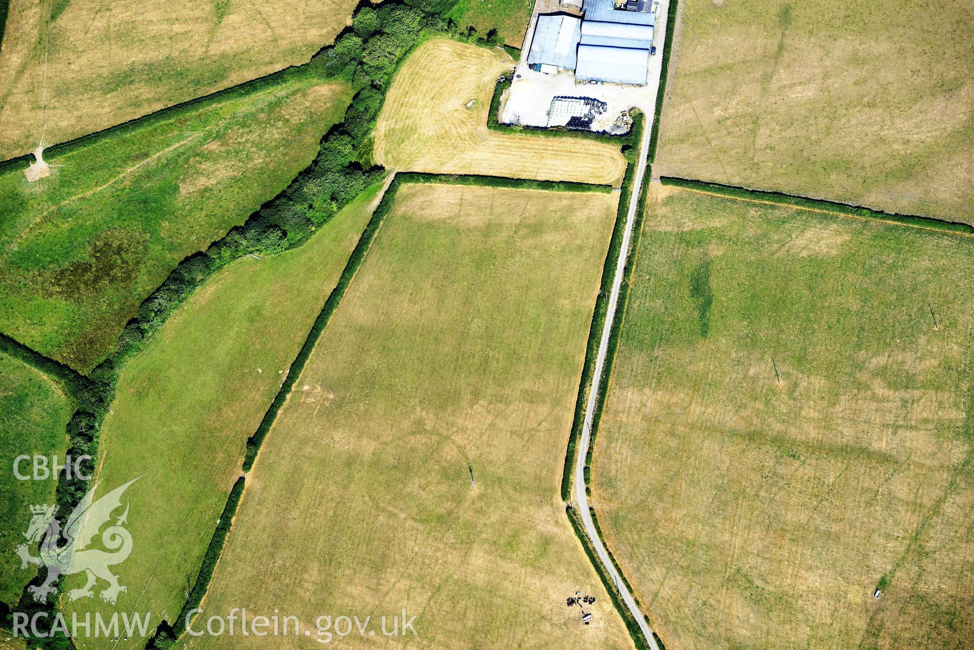 Aerial photograph: Eisteddfa circular enclosure cropmarks. Crown: CHERISH PROJECT 2018. Produced with EU funds through the Ireland Wales Co-operation Programme 2014-2020 (NGR: SN314529)