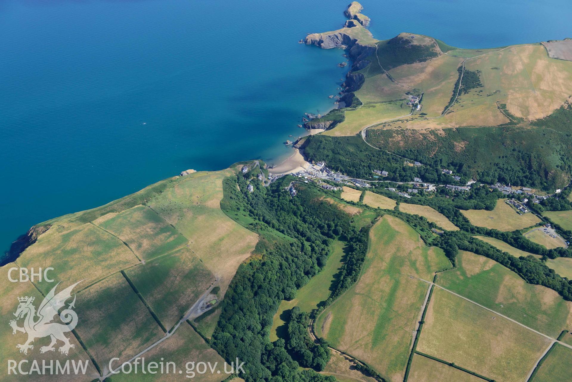 Aerial photograph: Craig Pentre ridge fort, and Llangrannog village. Crown: CHERISH PROJECT 2018. Produced with EU funds through the Ireland Wales Co-operation Programme 2014-2020 (NGR: SN311538)