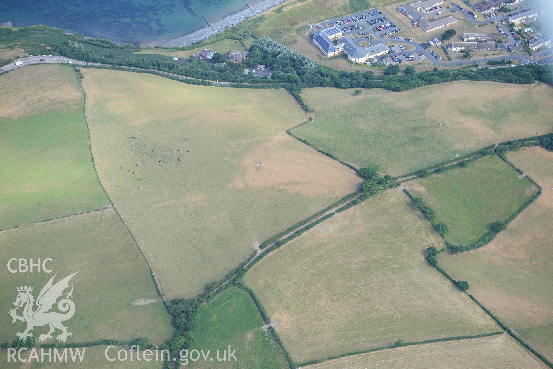 Aerial photograph: Pant-teg defended enclosure cropmarks. Crown: CHERISH PROJECT 2018. Produced with EU funds through the Ireland Wales Co-operation Programme 2014-2020 (NGR: SN453622)