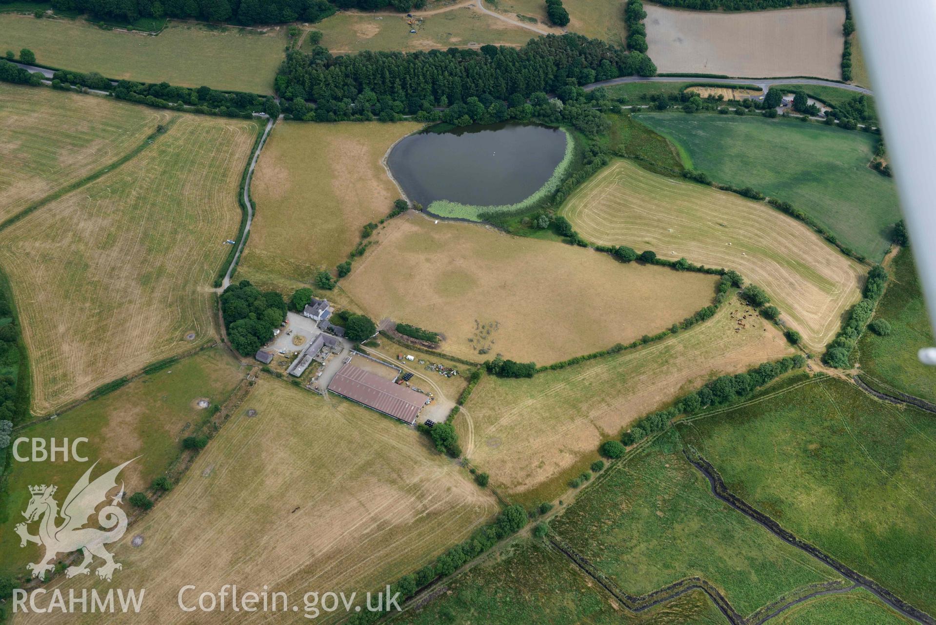 Aerial photograph: Maes-Llyn, cropmarks of enclosures and ditches. Crown: CHERISH PROJECT 2018. Produced with EU funds through the Ireland Wales Co-operation Programme 2014-2020 (NGR SN692629)