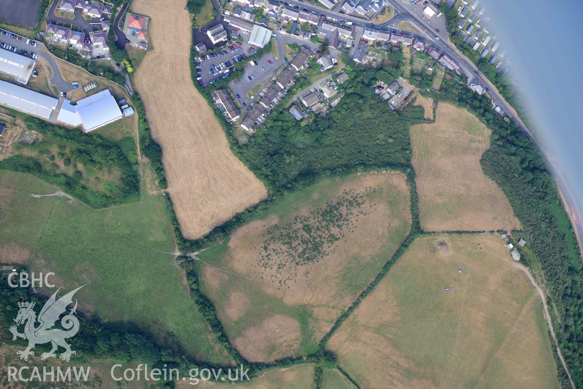 Aerial photograph: Aberaeron, ill-defined parchmarks of possible archaeology, in north of town. Crown: CHERISH PROJECT 2018. Produced with EU funds through the Ireland Wales Co-operation Programme 2014-2020 (NGR: SN463629)