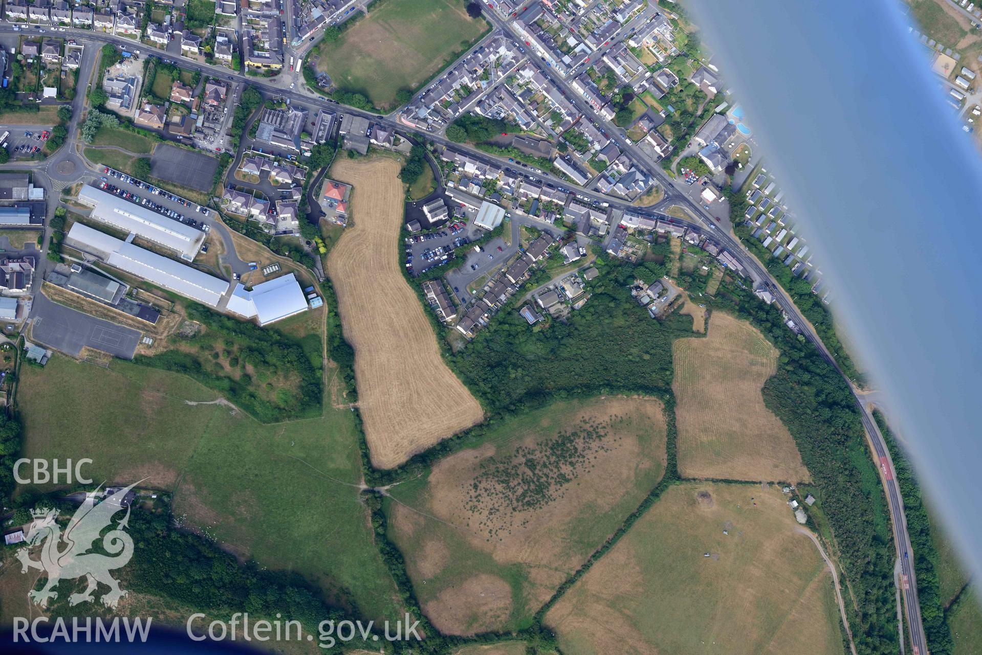 Aerial photograph: Aberaeron, ill-defined parchmarks of possible archaeology, in north of town. Crown: CHERISH PROJECT 2018. Produced with EU funds through the Ireland Wales Co-operation Programme 2014-2020 (NGR: SN463629)