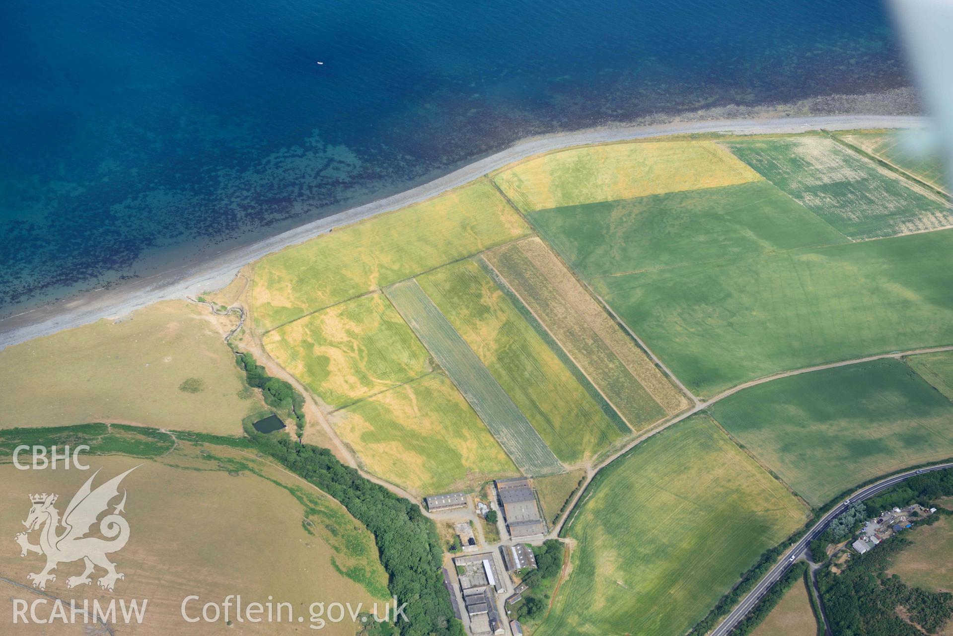 Aerial photograph: Morfa-mawr, natural cropmarks of river channels. Crown: CHERISH PROJECT 2018. Produced with EU funds through the Ireland Wales Co-operation Programme 2014-2020 (NGR: SN503656)