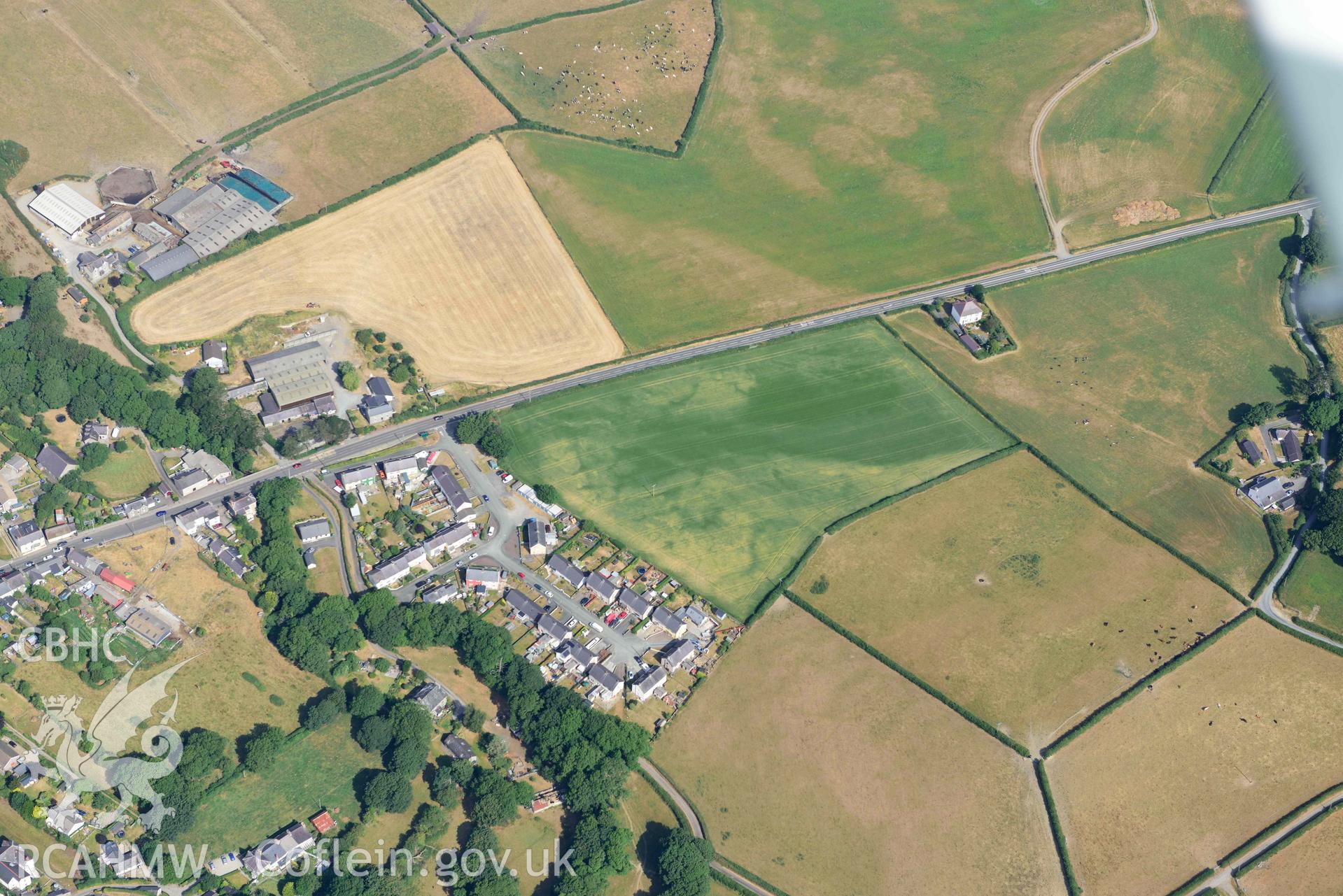 Aerial photograph: Llanon village. Various non-archaeological cropmarks near Penlon Farm Crown: CHERISH PROJECT 2018. Produced with EU funds through the Ireland Wales Co-operation Programme 2014-2020 (NGR: SN517675)