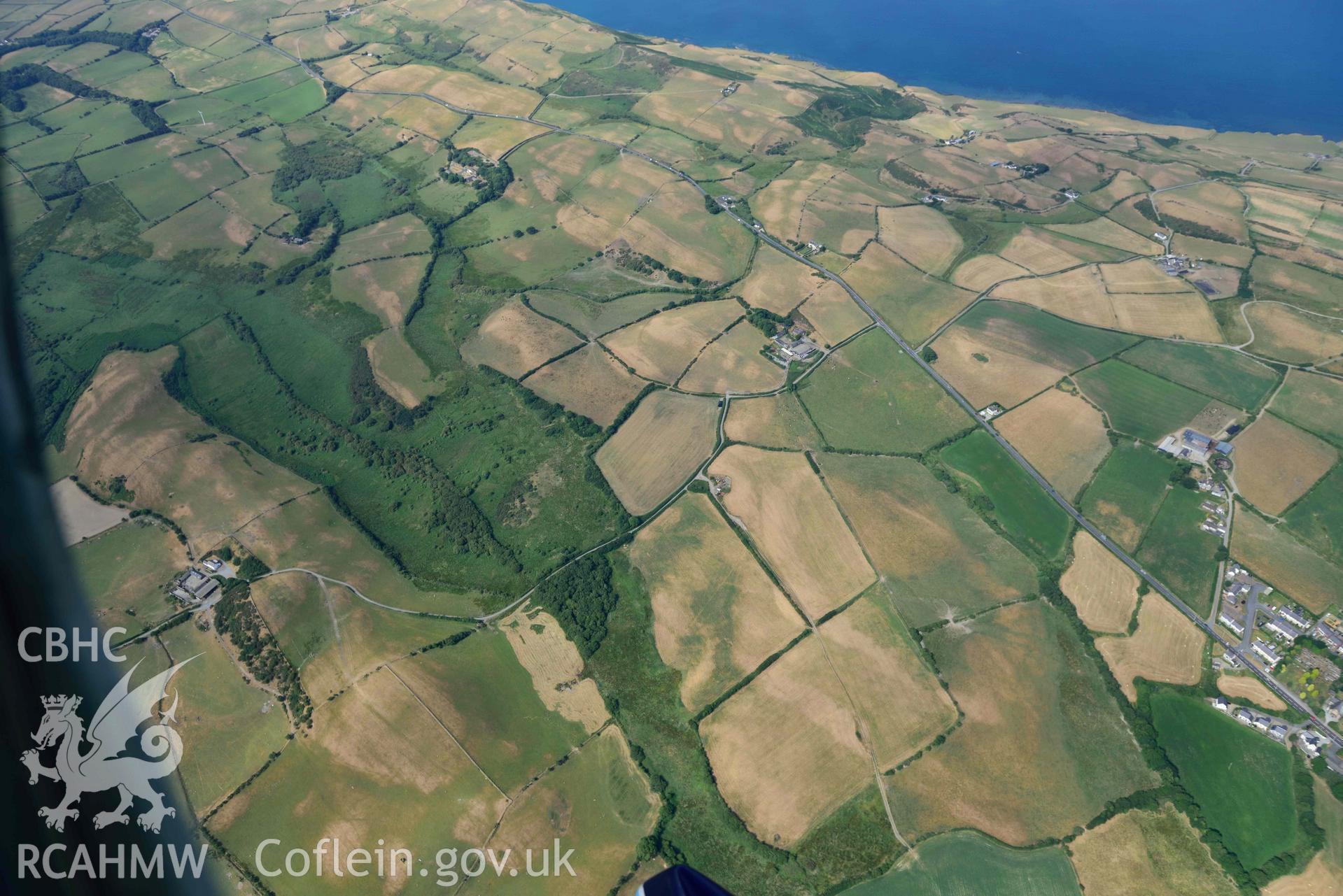 Aerial photograph: Rhos Rydd wetland, and Cardigan Bay coastal plain, view from northeast. Crown: CHERISH PROJECT 2018. Produced with EU funds through the Ireland Wales Co-operation Programme 2014-2020 (NGR: SN575745)