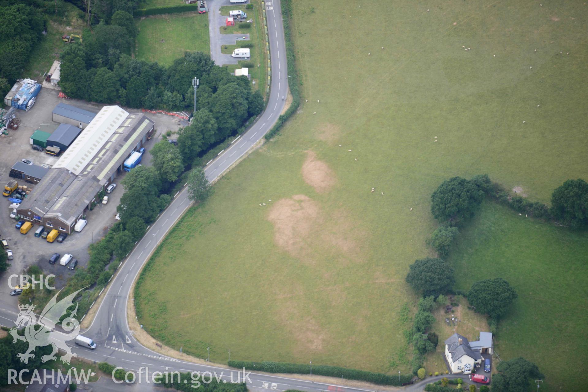 Aerial photograph: Bryncrug, Pont y Felindre, square barrow cemetery. Crown: CHERISH PROJECT 2018. Produced with EU funds through the Ireland Wales Co-operation Programme 2014-2020 (NGR SH613032)