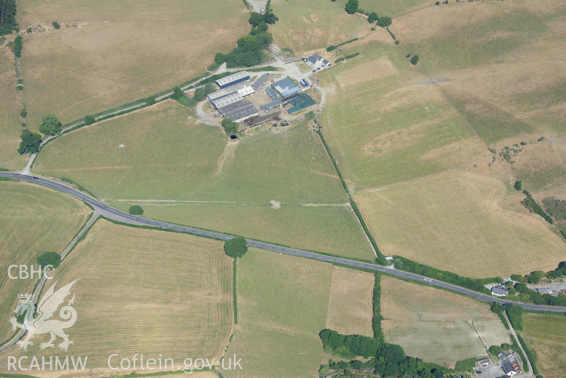 Aerial photograph: Pwll-glas, farm house and possible Roman road. Crown: CHERISH PROJECT 2018. Produced with EU funds through the Ireland Wales Co-operation Programme 2014-2020 (NGR: SN637869)