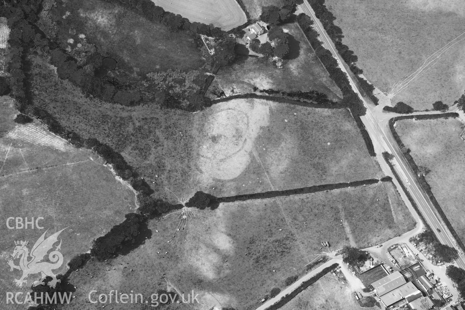 Aerial photograph: Odyn Fach defended enclosure, cropmarks. Crown: CHERISH PROJECT 2018. Produced with EU funds through the Ireland Wales Co-operation Programme 2014-2020 (NGR: SN646876)