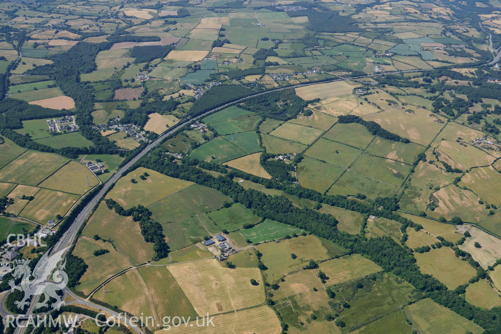 Aerial photograph: Section of Roman road passing through Glasynfryn Farm, Glasinfryn. Wide view looking south-west. Crown: CHERISH PROJECT 2018. Produced with EU funds through the Ireland Wales Co-operation Programme 2014-2020 (NGR: SH582692)