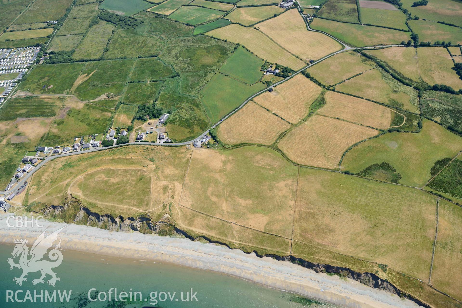 Aerial photograph: Dinas Dinlle hillfort, with parchmarks. Crown: CHERISH PROJECT 2018. Produced with EU funds through the Ireland Wales Co-operation Programme 2014-2020 (NGR: SH437563)