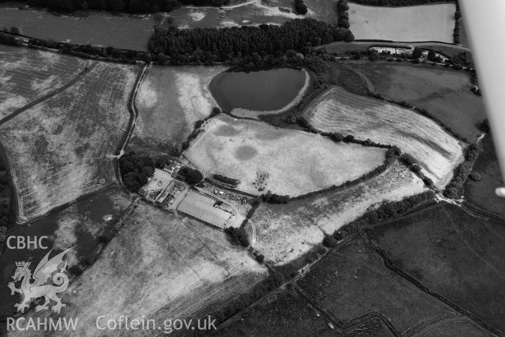 Aerial photograph: Maes-Llyn, cropmarks of enclosures and ditches. Crown: CHERISH PROJECT 2018. Produced with EU funds through the Ireland Wales Co-operation Programme 2014-2020 (NGR SN692629)