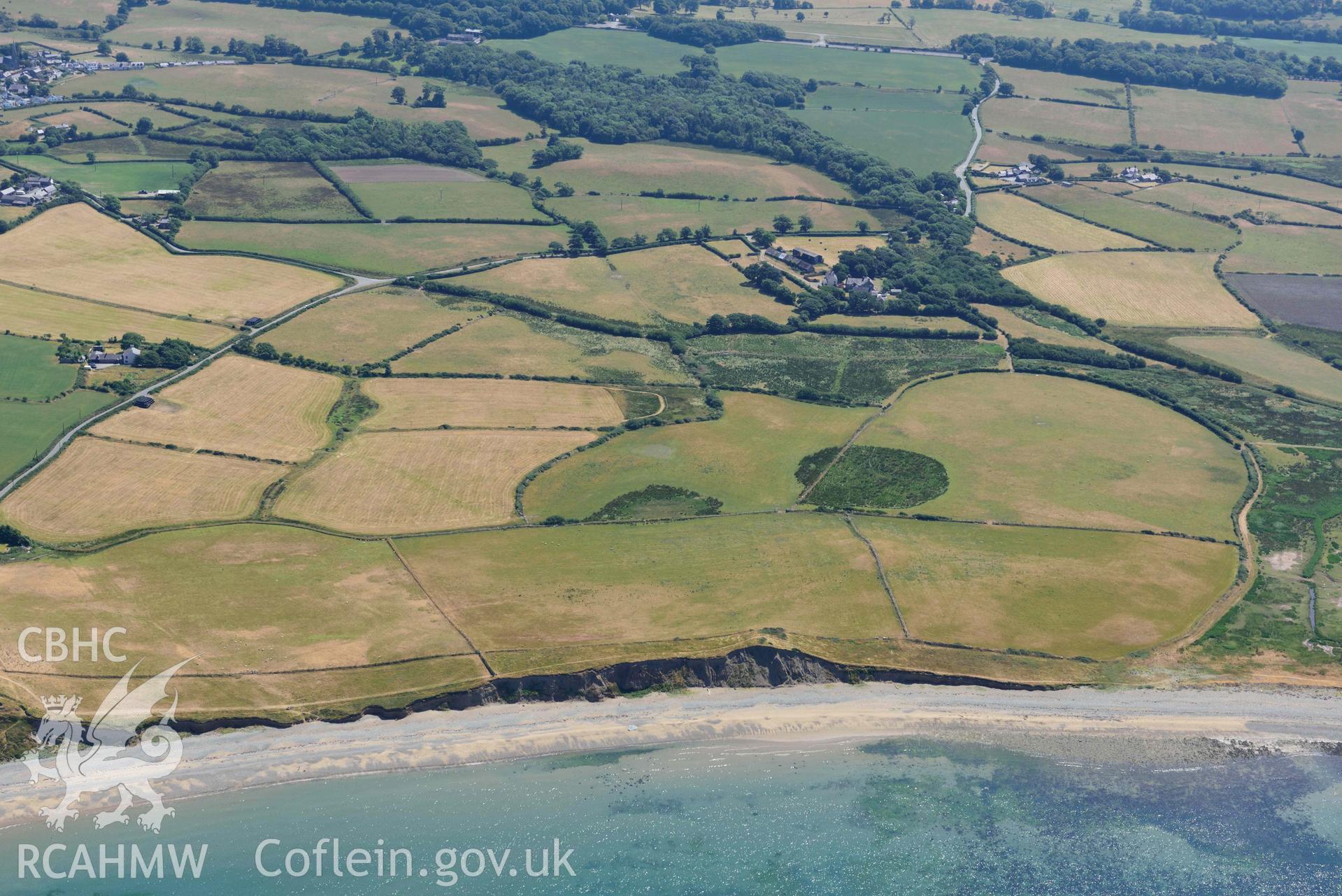 Aerial photograph: Field system south of Dinas Dinlle, view from west. Crown: CHERISH PROJECT 2018. Produced with EU funds through the Ireland Wales Co-operation Programme 2014-2020 (NGR: SH438561)