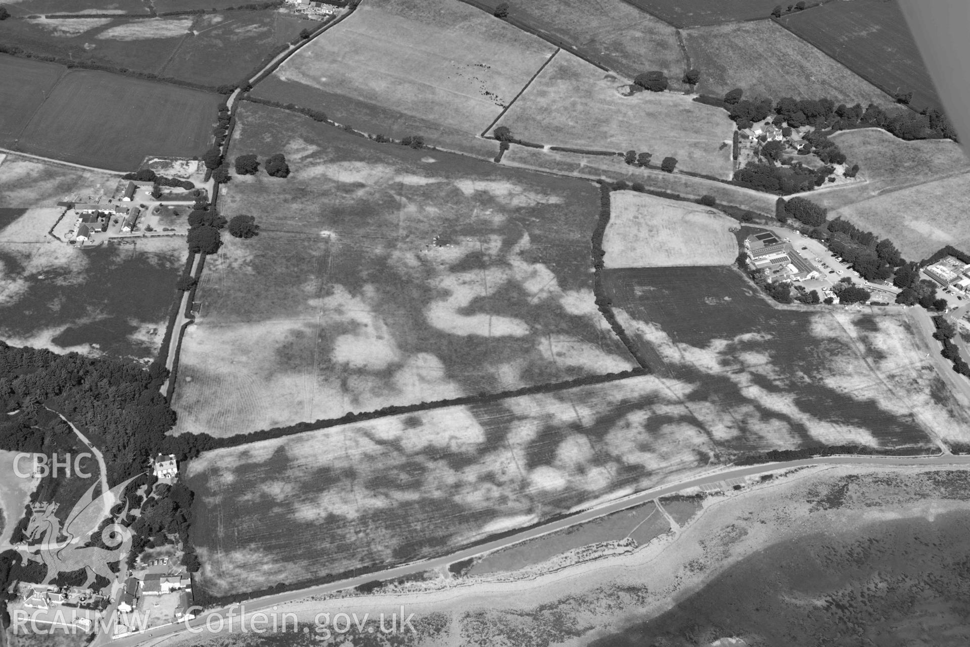 Aerial photograph: Tai Cochion Roman settlement, parchmarks of boundaries. Crown: CHERISH PROJECT 2018. Produced with EU funds through the Ireland Wales Co-operation Programme 2014-2020 (NGR: SH479656)