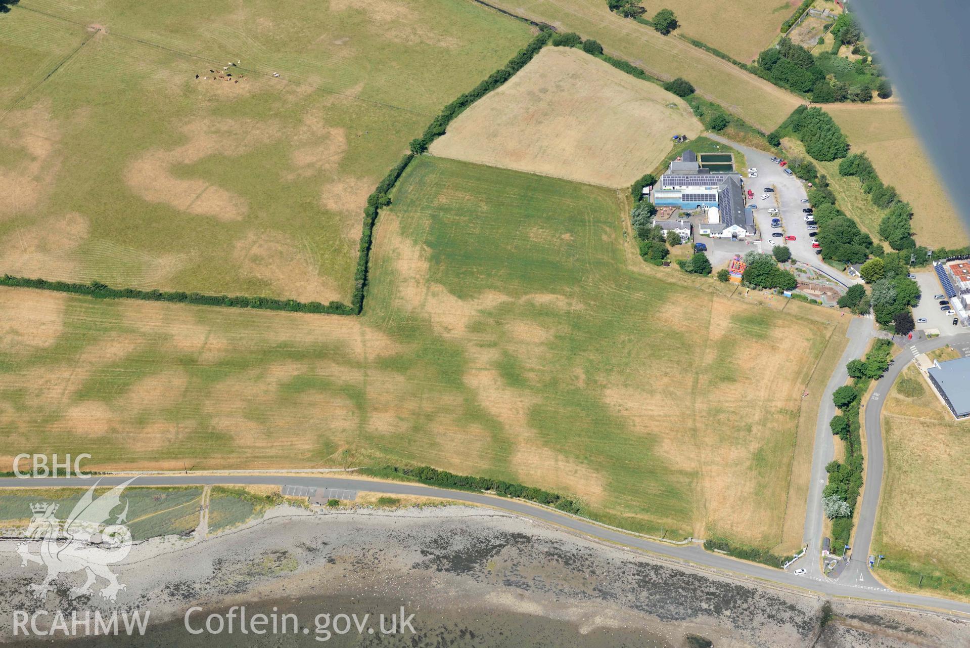 Aerial photograph: Tai Cochion Roman settlement, parchmarks. Crown: CHERISH PROJECT 2018. Produced with EU funds through the Ireland Wales Co-operation Programme 2014-2020 (NGR: SH479656)