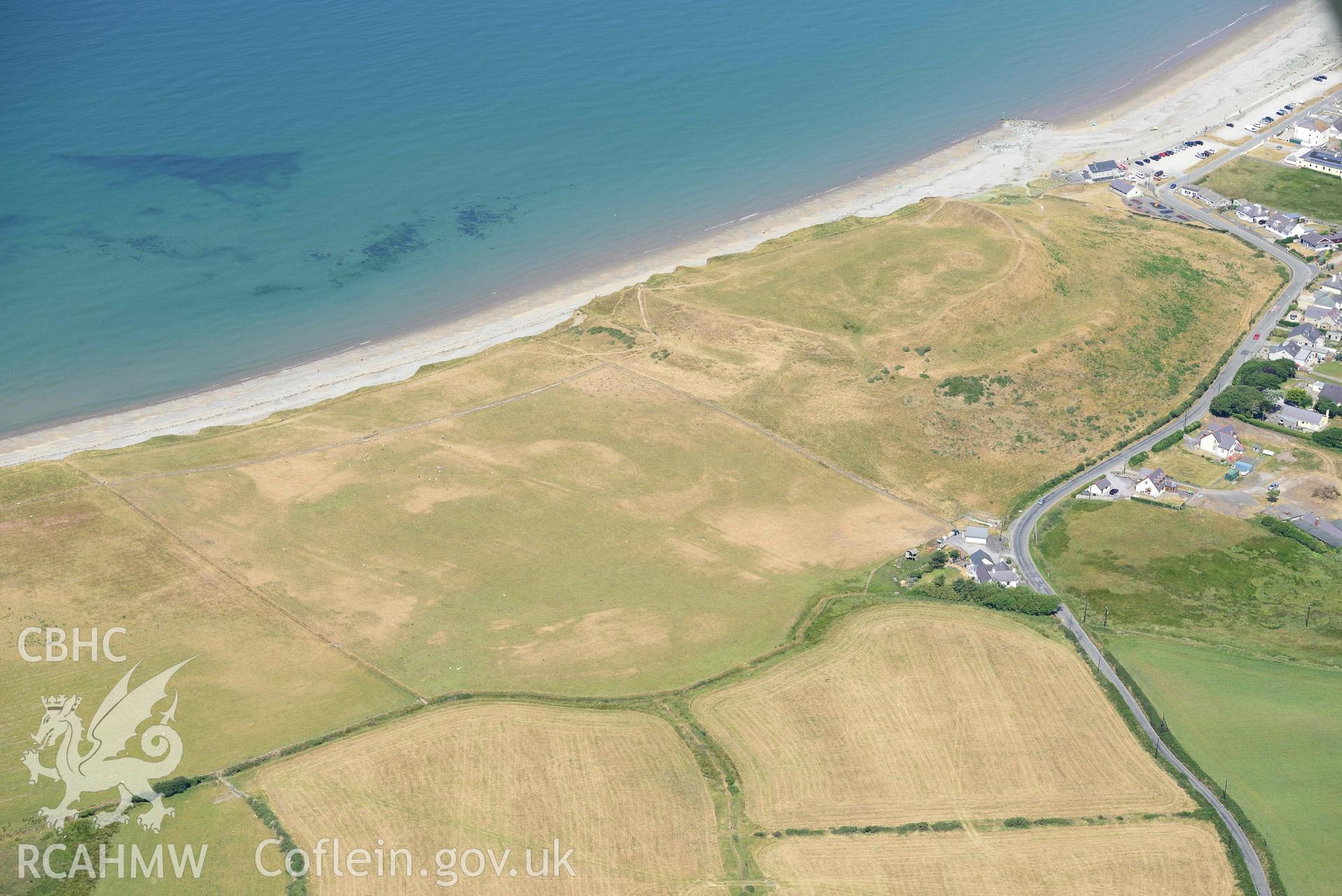 Aerial photograph: Field system south of Dinas Dinlle, view from west. Crown: CHERISH PROJECT 2018. Produced with EU funds through the Ireland Wales Co-operation Programme 2014-2020 (NGR: SH438561)