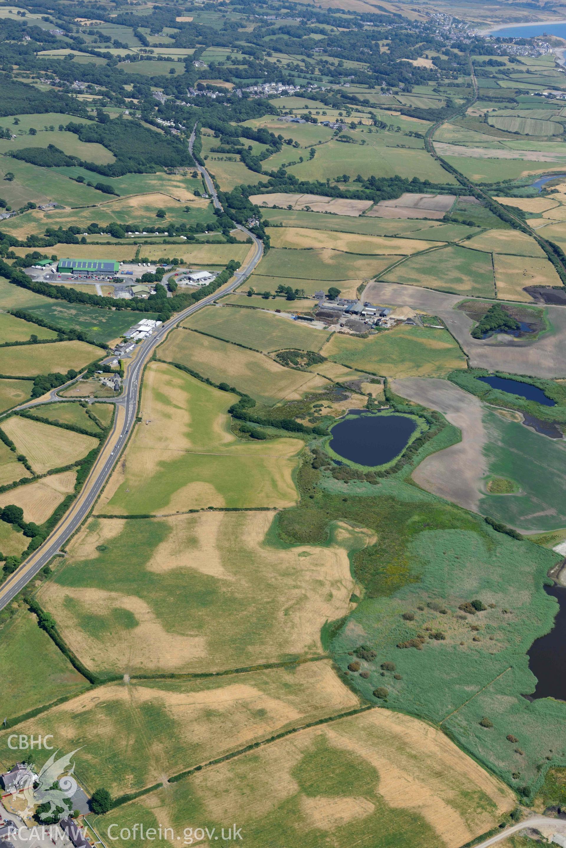 Aerial photograph: Glanllynnau early field system cropmarks, view from west. Crown: CHERISH PROJECT 2018. Produced with EU funds through the Ireland Wales Co-operation Programme 2014-2020 (NGR SH452375)