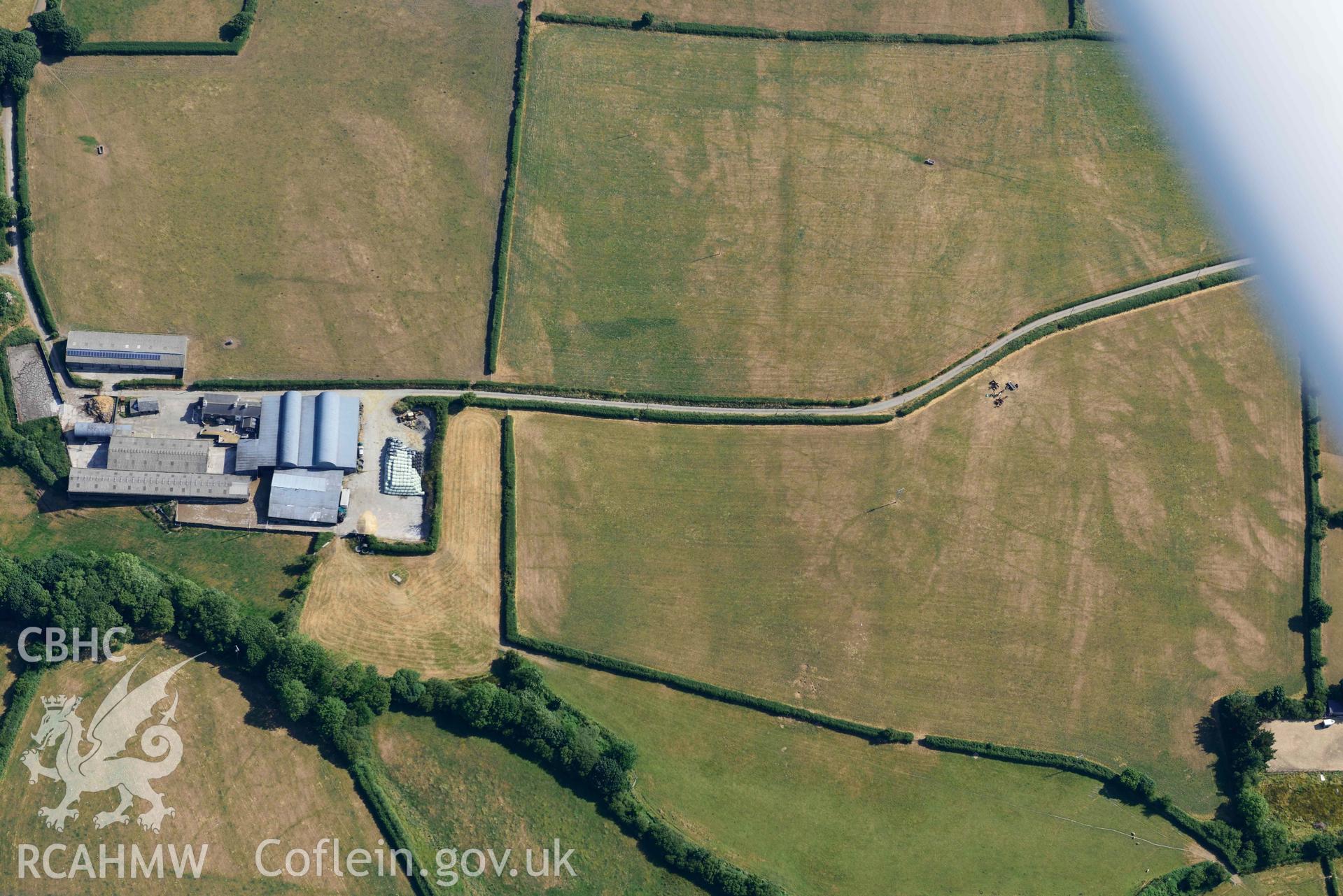 Aerial photograph: Eisteddfa circular enclosure cropmarks. Crown: CHERISH PROJECT 2018. Produced with EU funds through the Ireland Wales Co-operation Programme 2014-2020 (NGR: SN314529)