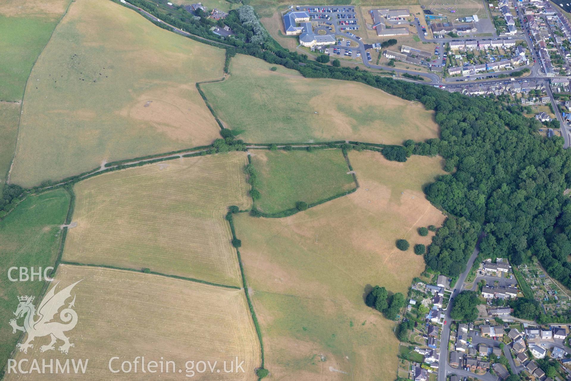 Aerial photograph: Pant-teg defended enclosure cropmarks. Crown: CHERISH PROJECT 2018. Produced with EU funds through the Ireland Wales Co-operation Programme 2014-2020 (NGR: SN453622)