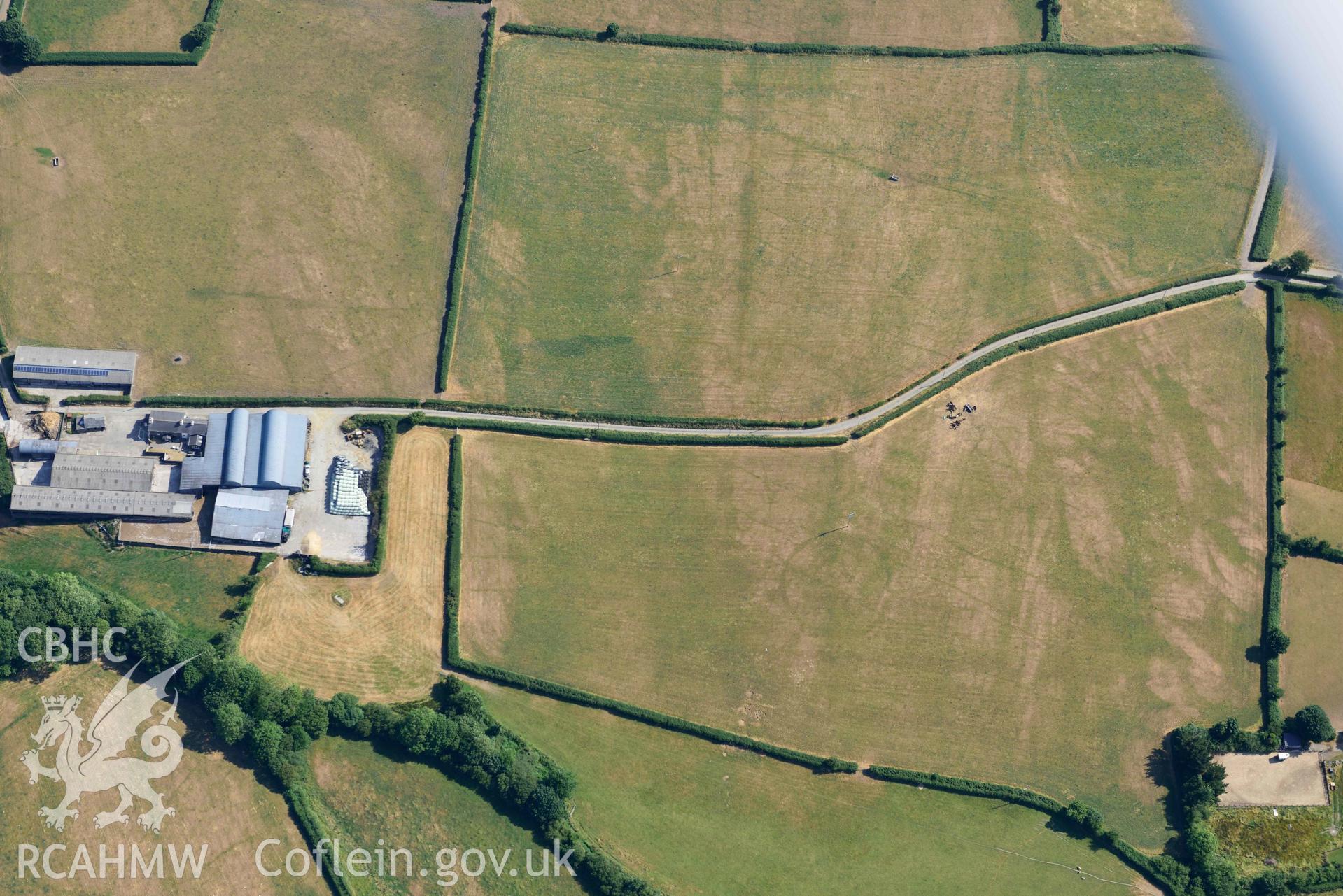 Aerial photograph: Eisteddfa circular enclosure cropmarks. Crown: CHERISH PROJECT 2018. Produced with EU funds through the Ireland Wales Co-operation Programme 2014-2020 (NGR: SN314529)