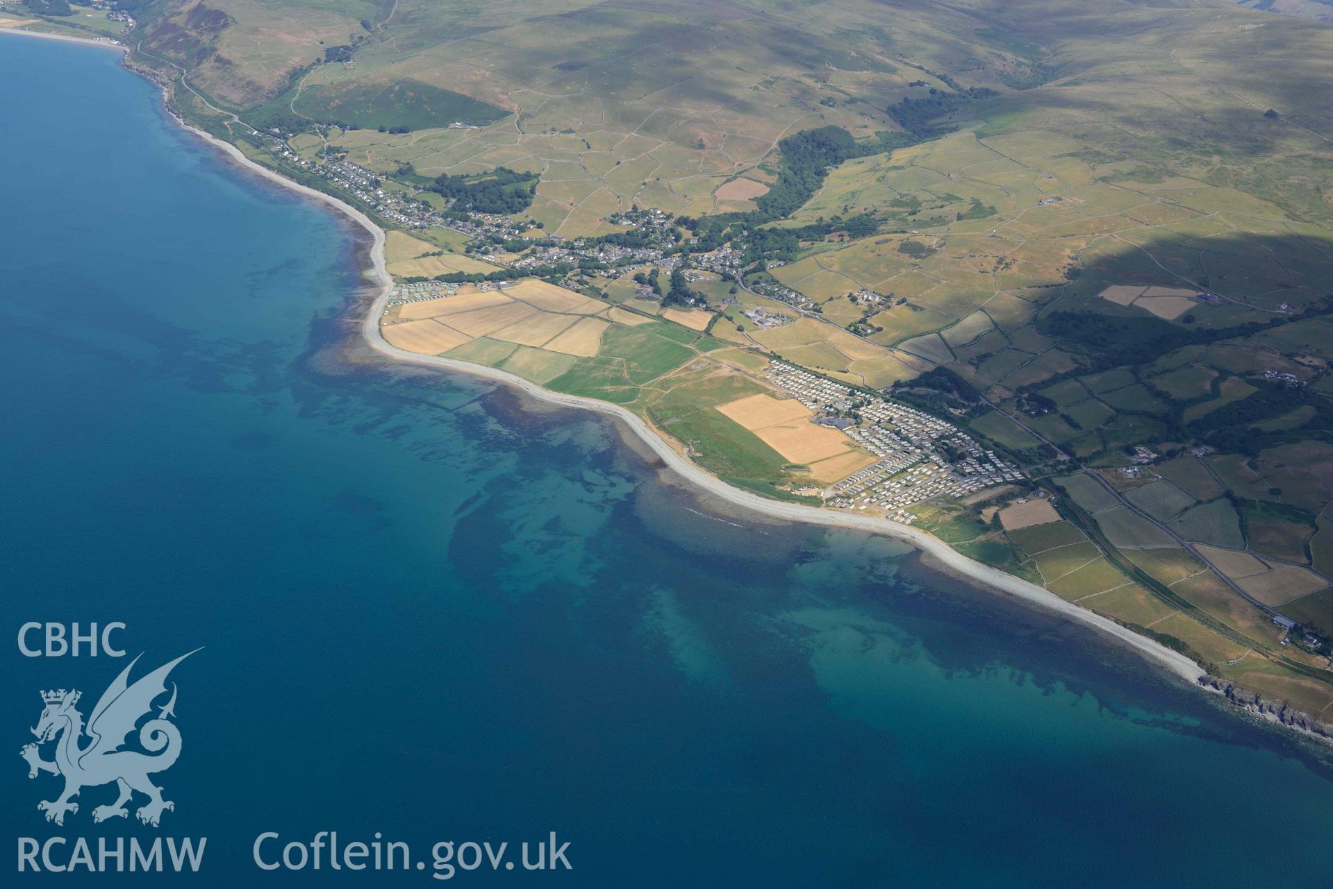 Aerial photograph: Llwyngwril village, view from the south-west. Crown: CHERISH PROJECT 2018. Produced with EU funds through the Ireland Wales Co-operation Programme 2014-2020 (NGR SH591095)