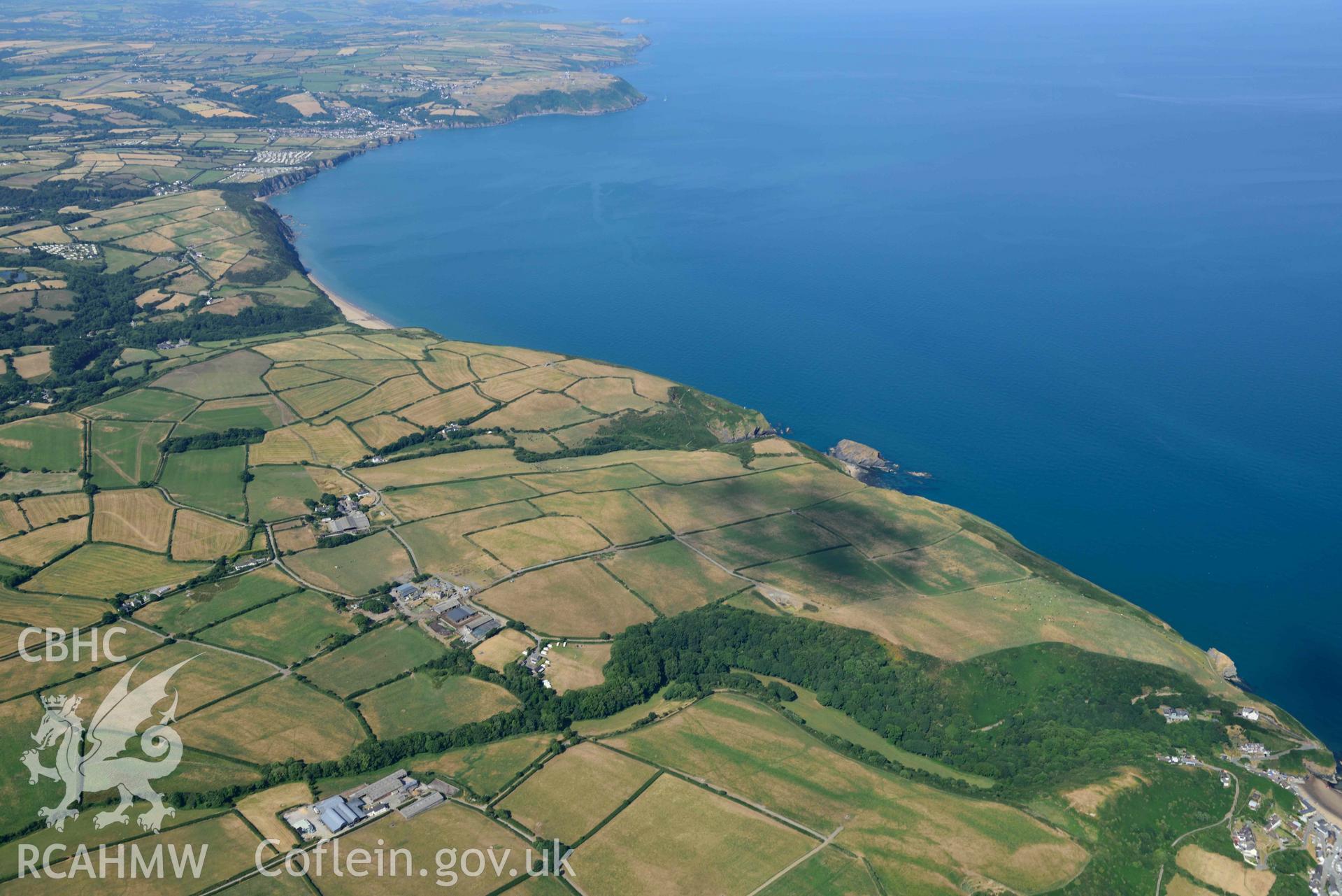 Aerial photograph: Craig Pentre ridge fort, and coastal landscape looking southwest from Llangrannog. Crown: CHERISH PROJECT 2018. Produced with EU funds through the Ireland Wales Co-operation Programme 2014-2020 (NGR: SN311538)