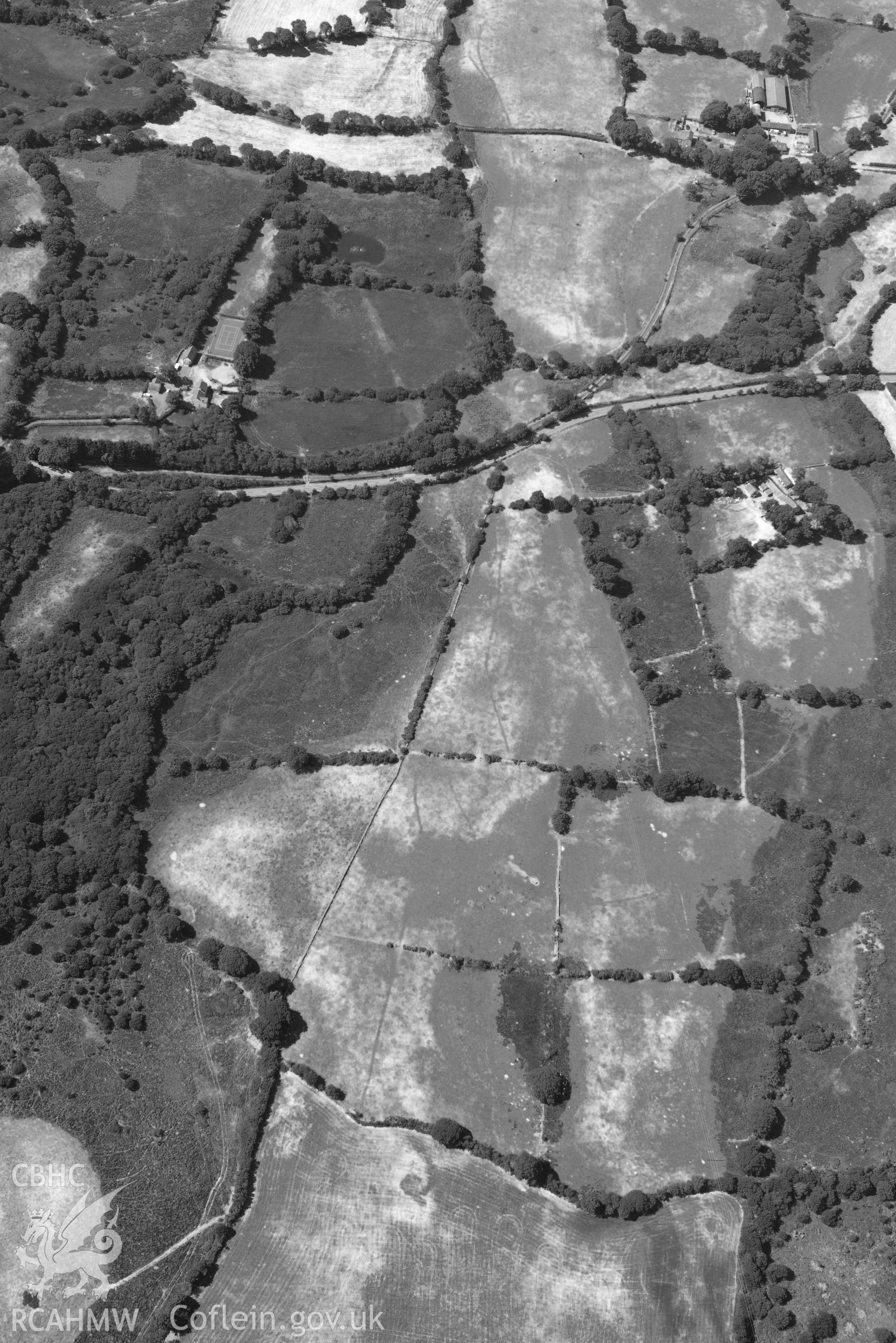 Aerial photograph: Roman road passing through Rhos Isaf. Parchmarks at Dolau Gwyn. Crown: CHERISH PROJECT 2018. Produced with EU funds through the Ireland Wales Co-operation Programme 2014-2020 (NGR: SH489586)