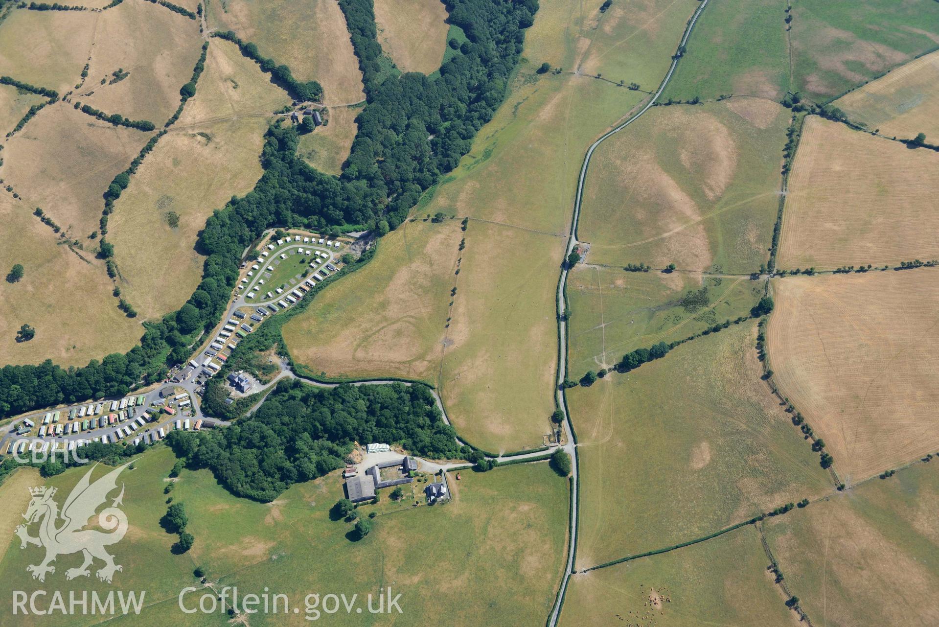 Aerial photograph: Glan Fred defended enclosure. Wide view with surrounding fields. Crown: CHERISH PROJECT 2018. Produced with EU funds through the Ireland Wales Co-operation Programme 2014-2020 (NGR: SN634878)