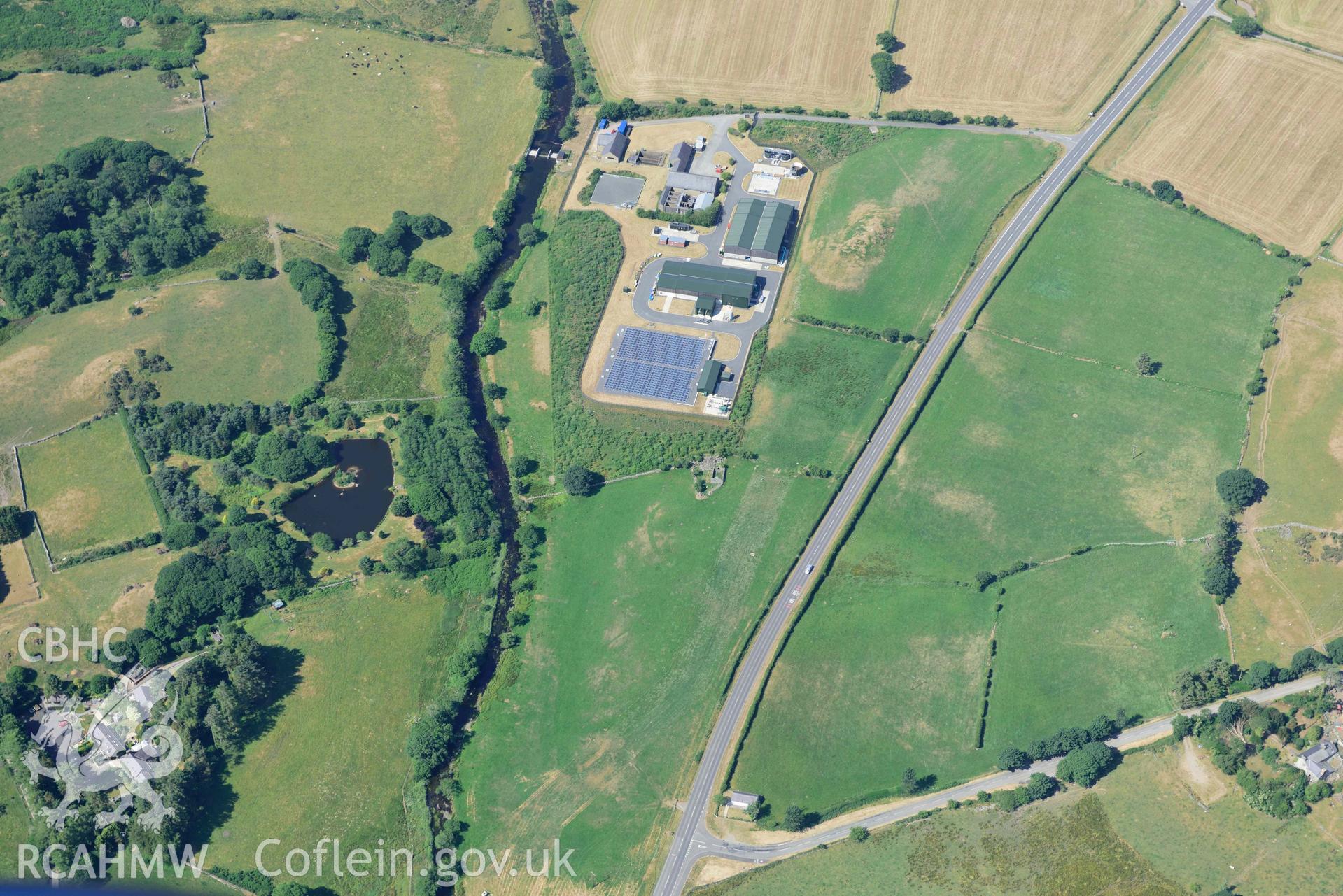 Aerial photograph: Garndolbenmaen village: new water works to south at Beudy Mawr. Crown: CHERISH PROJECT 2018. Produced with EU funds through the Ireland Wales Co-operation Programme 2014-2020 (NGR: SH499430)