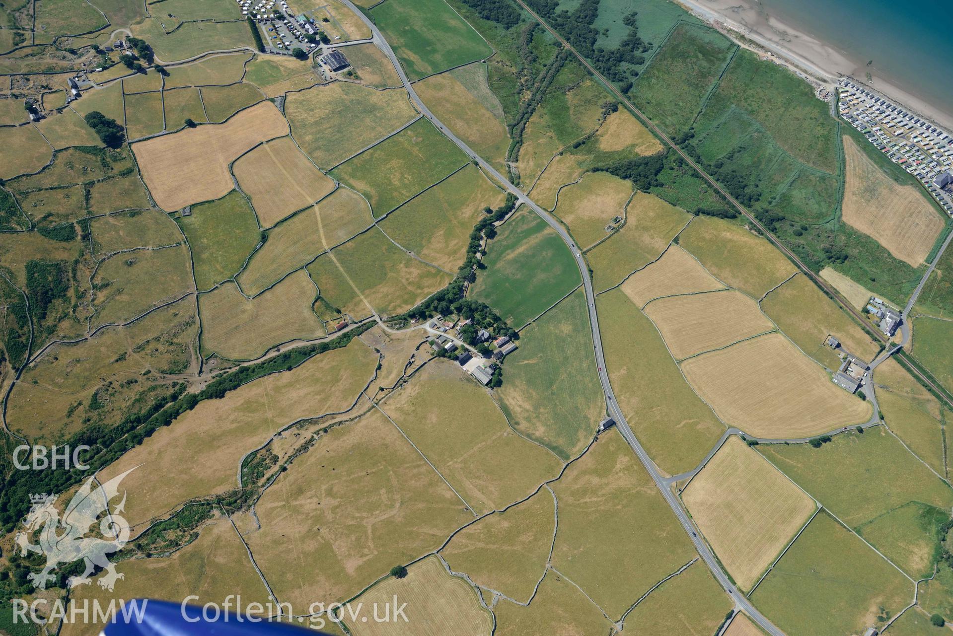 Aerial photograph: Egryn Abbey, with parchmarks of former fields. Crown: CHERISH PROJECT 2018. Produced with EU funds through the Ireland Wales Co-operation Programme 2014-2020 (NGR: SH595203)